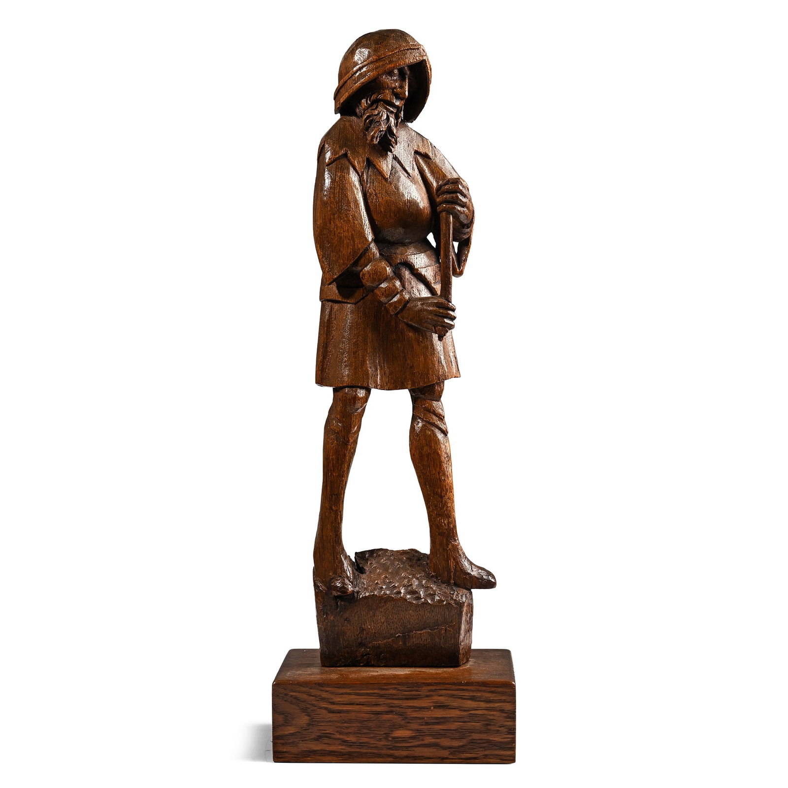 Medieval Oak Statue of Saint Longinus: Antwerp, 16th century A.D. Modelled standing with downcast eyes, wearing a short tunic, helmet and holding the shaft of a lance in his hands. 1.26 kg, 53.2 cm (21 in.). Acquired on the European art ma