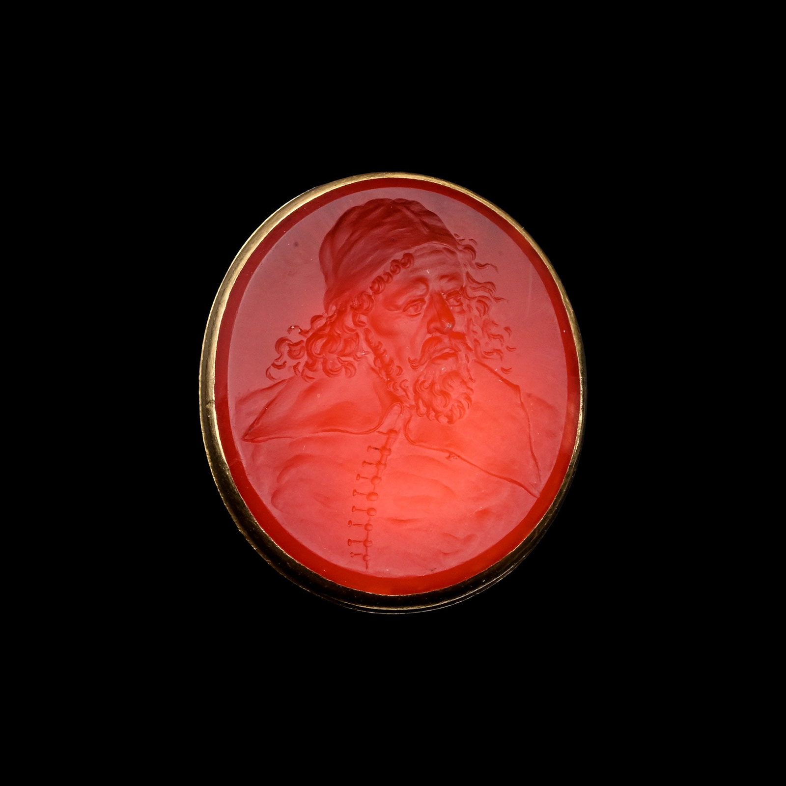 Georgian Era Gold Fob Seal with Carnelian Intaglio of Inigo Jones Attributed to Edward Burch: England, 18th century A.D. Vibrant red carnelian intaglio skilfully carved with a bust of a mature man in three-quarter view, gazing right, wearing a wide-collared, buttoned tunic and a cap, long curl