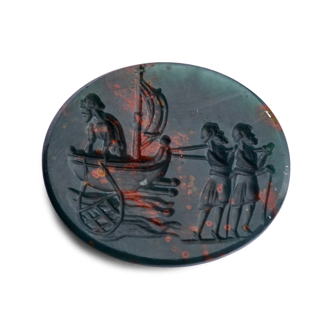 Georgian Period Bloodstone Gemstone with Christ Fishing: 17th-18th century A.D. Oval heliotrope intaglio showing a boat on water with an open sail, Christ casting a net in the water, and the boat drawn by the disciples; supplied with a museum-quality impres