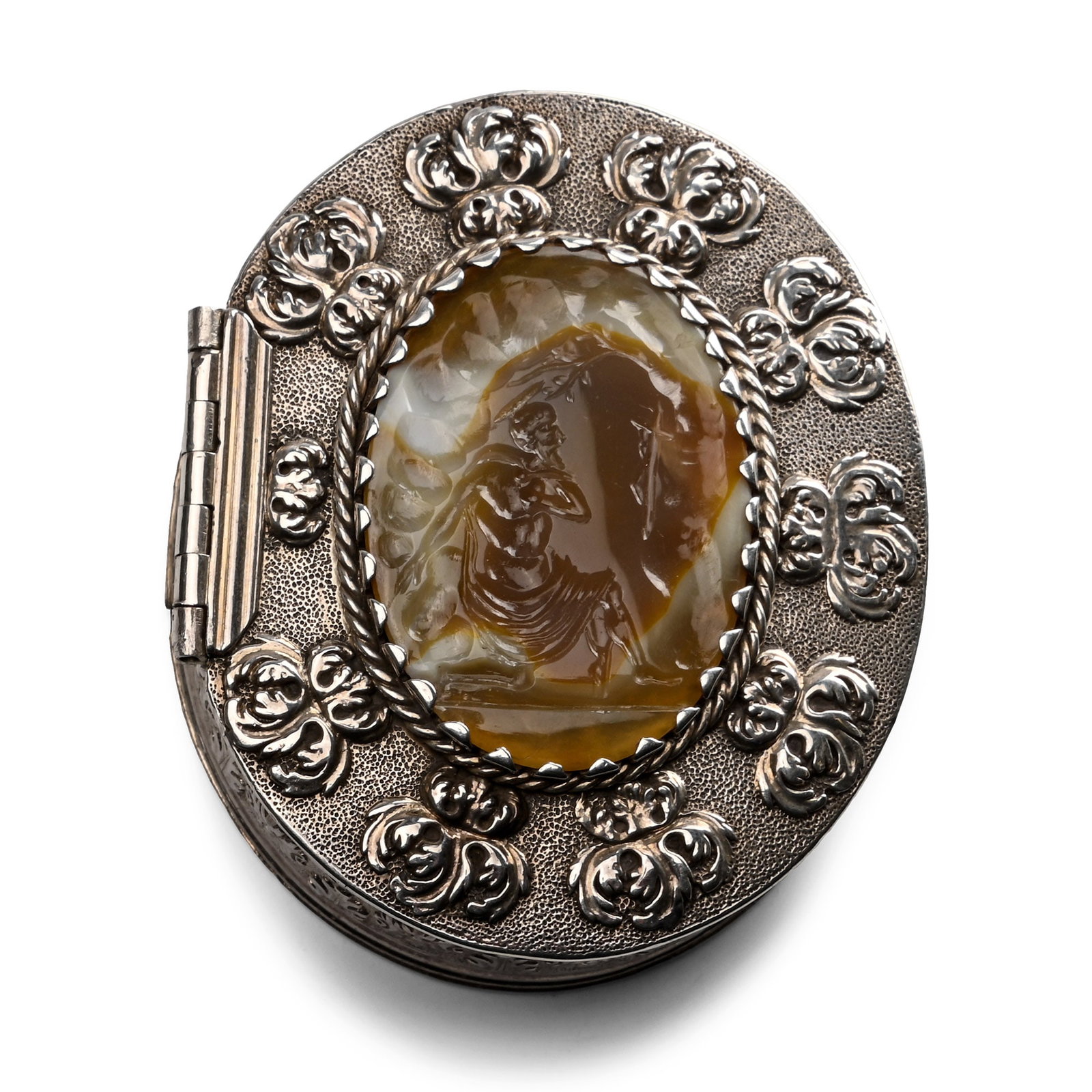 Post Medieval Silver Snuff Box Set with Agate Intaglio of Saint Jerome: Italy, 16th-17th century A.D. Decorated with a repeating motif of acanthus leaves and facing masks of Bacchus; lid of set with an agate intaglio of Saint Jerome kneeling before a crucifix within a rop
