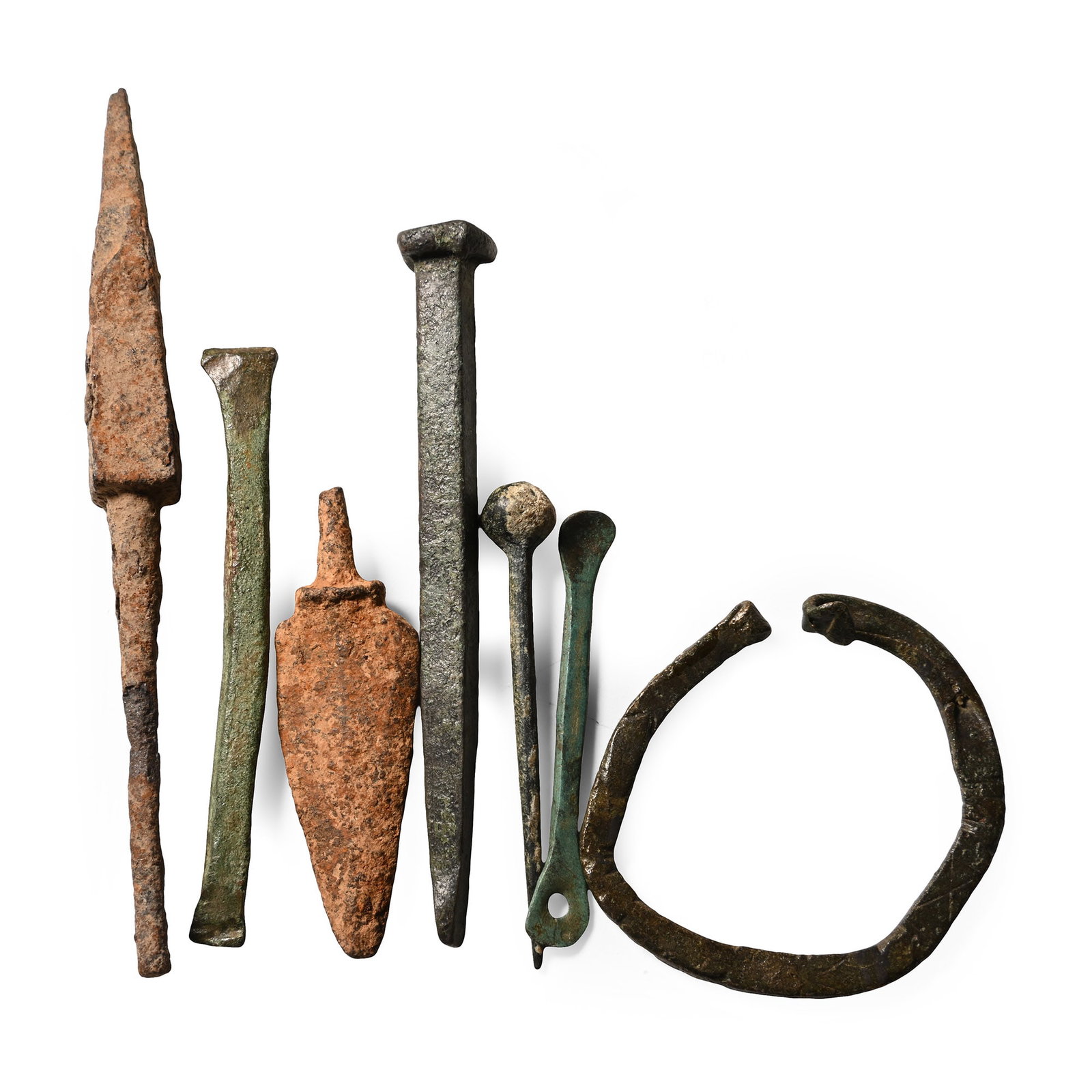Roman Bronze and Iron Artefact Collection: Circa 1st-4th century A.D. Comprising: ball-headed dess pin; stylus with eraser; cosmetic scoop; penannular quoit brooch with recurved ends; clout nail; leaf-shaped arrowhead; quarrel head with long t