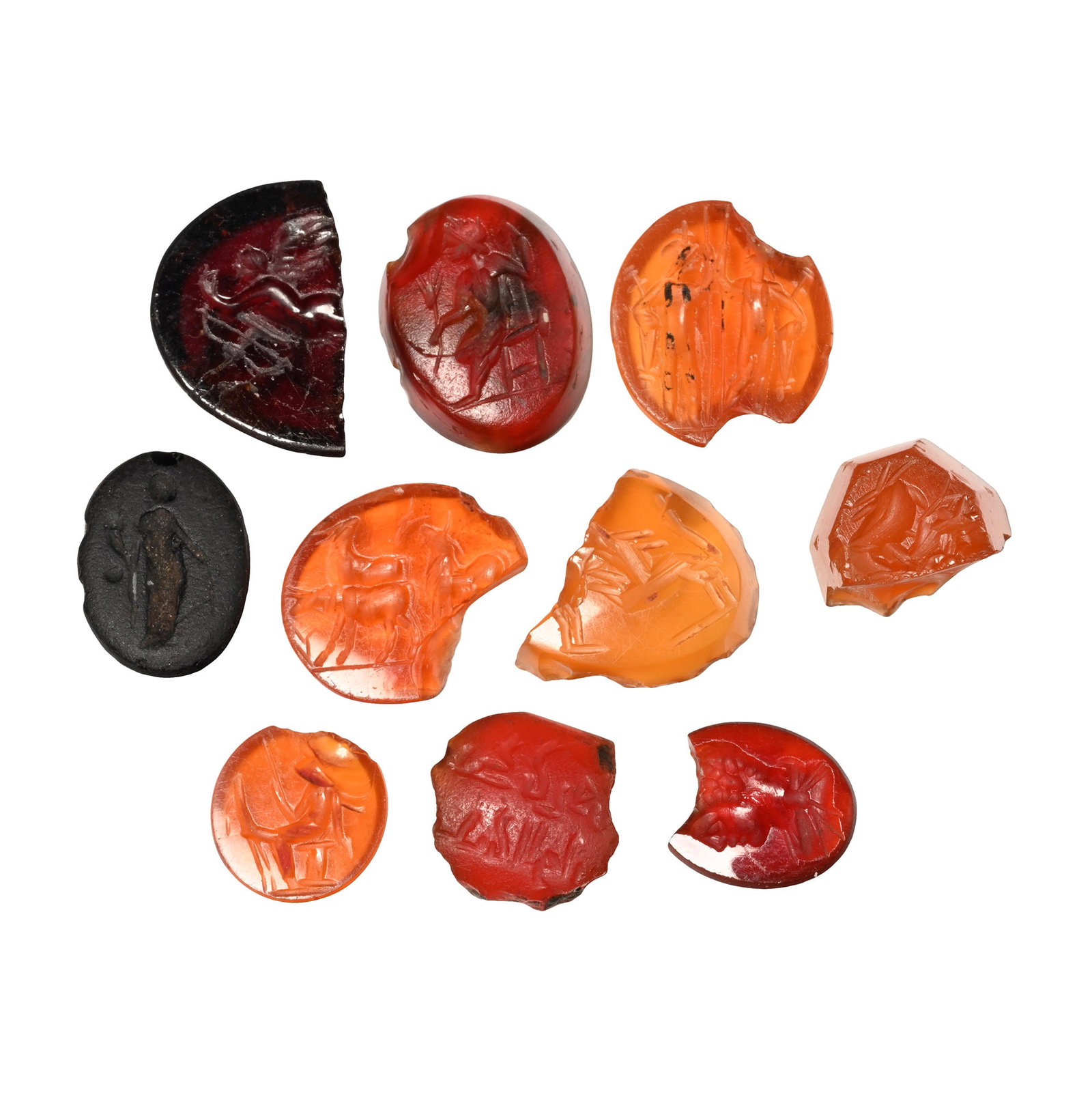 Roman Gemstone Group: 2nd-3rd century A.D. Including Cupid with bow, Mars with spear, Dioscouri and other types; each supplied with a museum-quality impression. 5.46 grams total, 9-14 mm (3/8 - 1/2 in.). [10, No Reserve] F