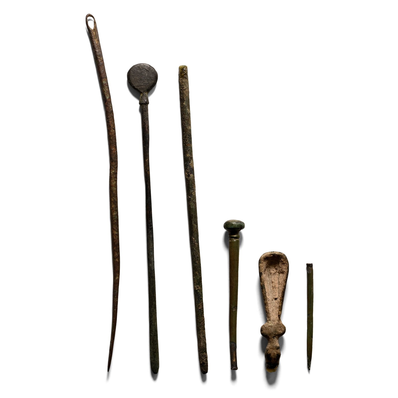 Roman Bronze Artefact Group: 1st-4th century A.D. Including a large net-needle, cosmetic or medicinal spoon with disc bowl and other items. 34.3 grams total, 4-13.6 cm (1 5/8 - 5 3/8 in.). [6, No Reserve] From the private collect