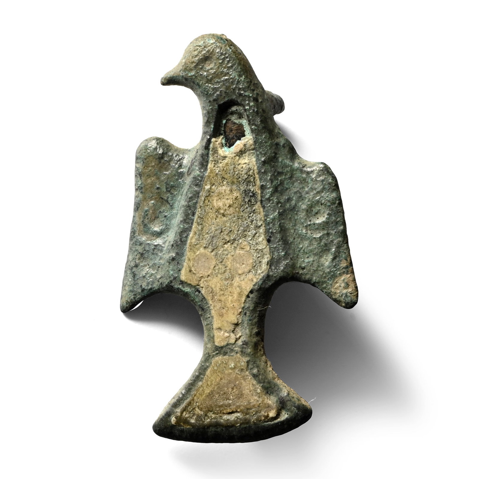 Roman Enamelled Bronze Bird Plate Brooch: 2nd-4th century A.D. Formed as a stylised bird with its head turned to the left, spread wings and tail, enamelled cells to the body and tail. 6.04 grams, 35 mm (1 3/8 in.). Ex German art market, 2000s