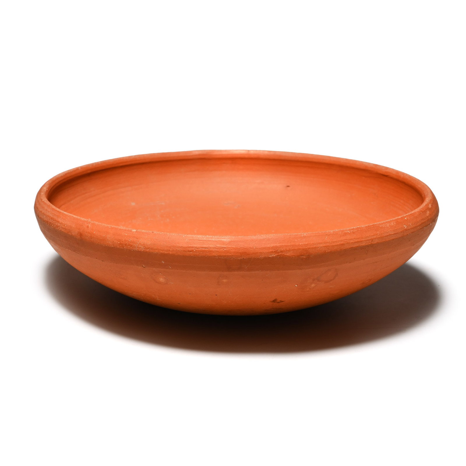 Roman Red Ware Bowl: 3rd-4th century A.D. Broad and squat in profile with inturned rim and external carination. Exhibited at the Harwich Museum, Harwich, Essex, UK, 8th June 2026-14th September 2026; accompanied by a copy