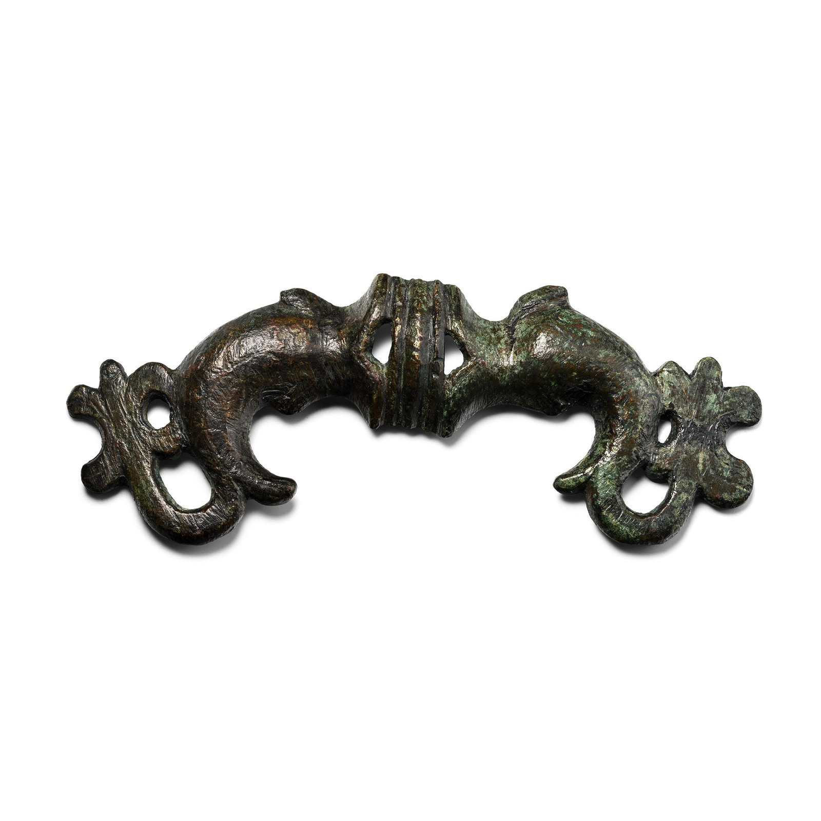 Roman Bronze Double Dolphin Mount: 1st-2nd century A.D. Concave mount with two opposing dolphins with curving tails, each with an open mouth. 56.7 grams, 10.7 cm (4 1/4 in.). Ex German art market, 2000s. Acquired from an EU collector l
