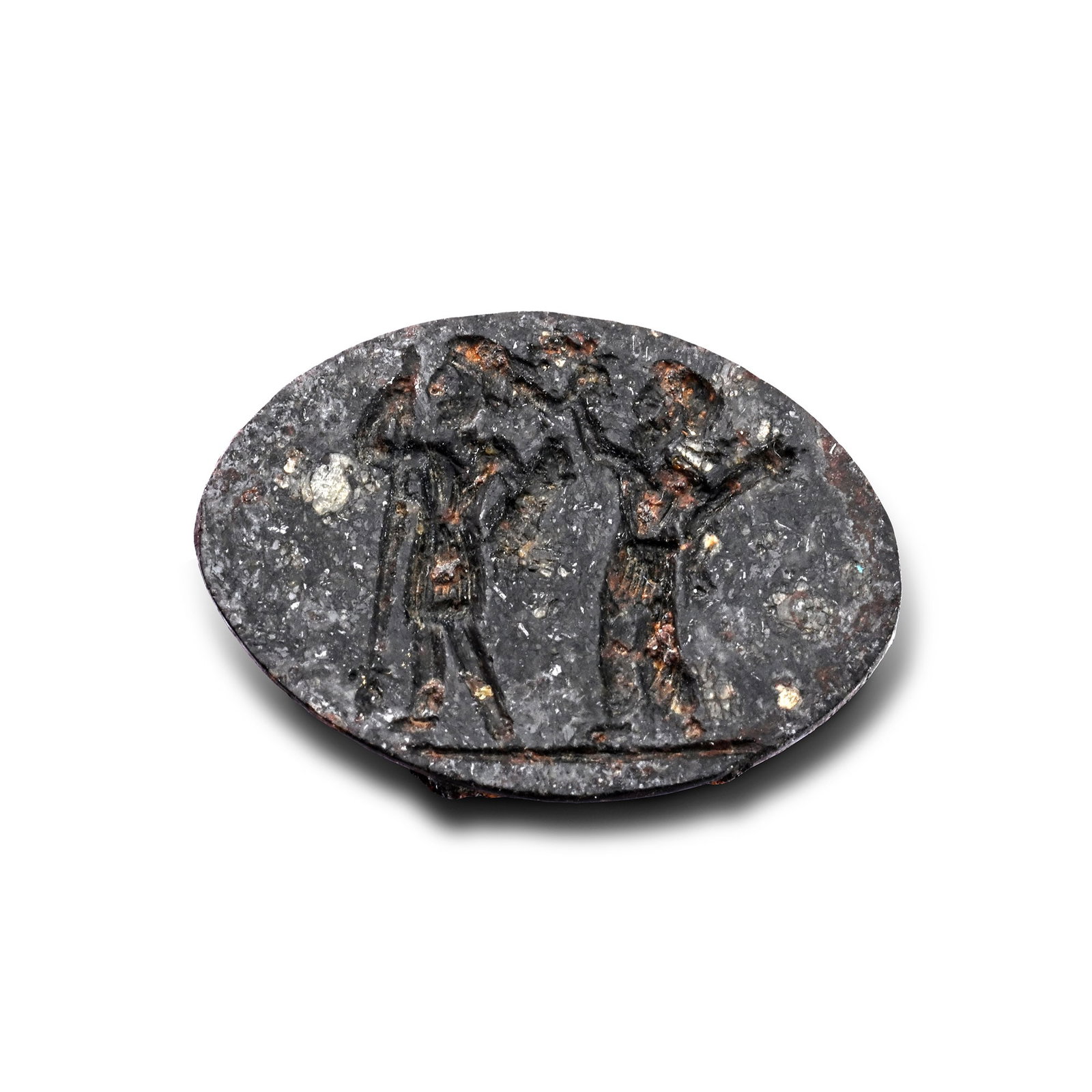 Roman Black Gemstone with Victory Scene: 2nd-3rd century A.D. Ellipsoid in plan with chamfered sides, intaglio scene with soldier or gladiator standing with a spear, figure to his rear holding a wreath above his head; supplied with a museum-