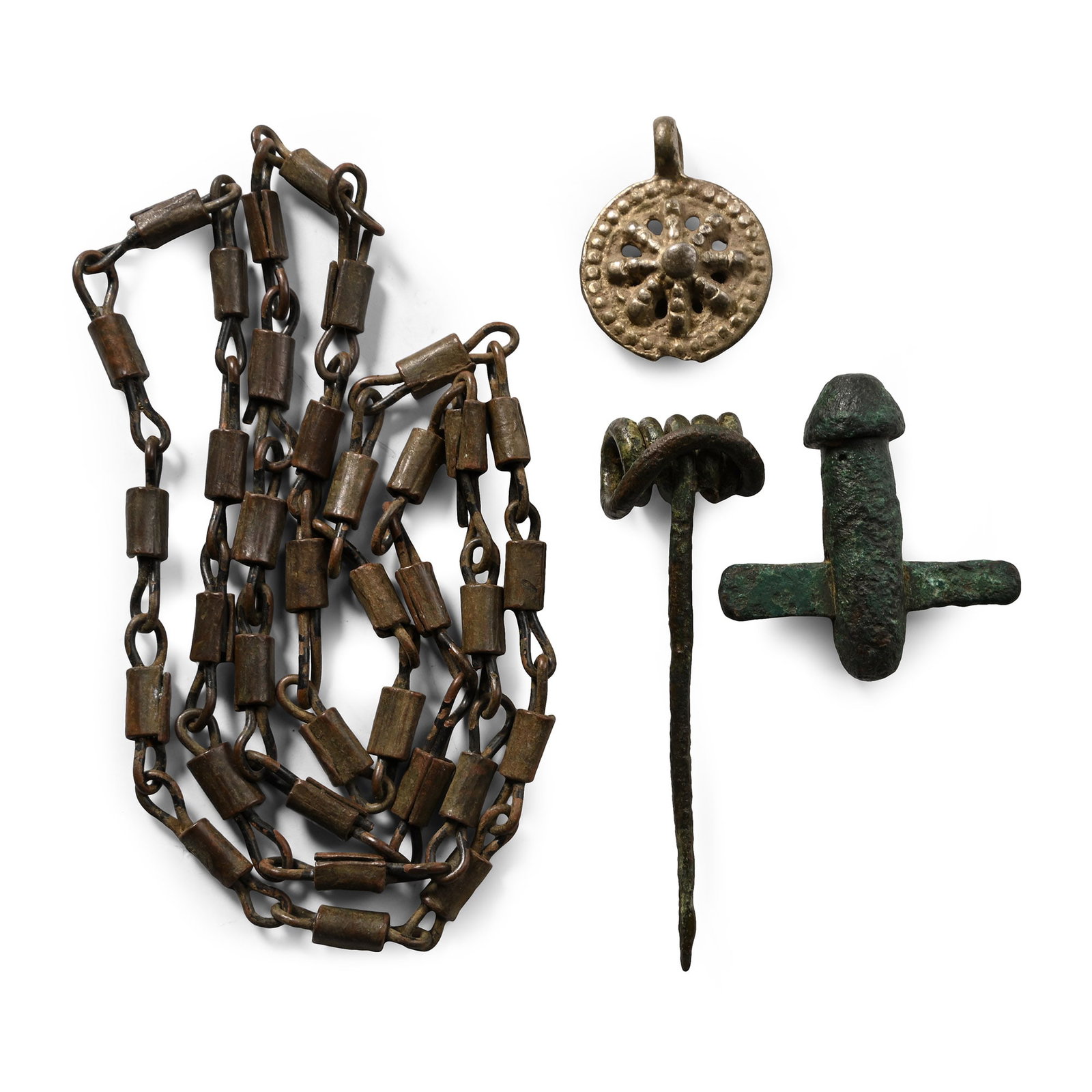 Roman to Post Medieval Artefact Group: 1st-20th century A.D. Comprising: a looped chain with collars; a phallic fitting; a coiled pin; a white metal discoid pendant with a star motif. 62.2 grams total, 2.8-65 cm (1 1/8 - 25 5/8 in.). [4, N