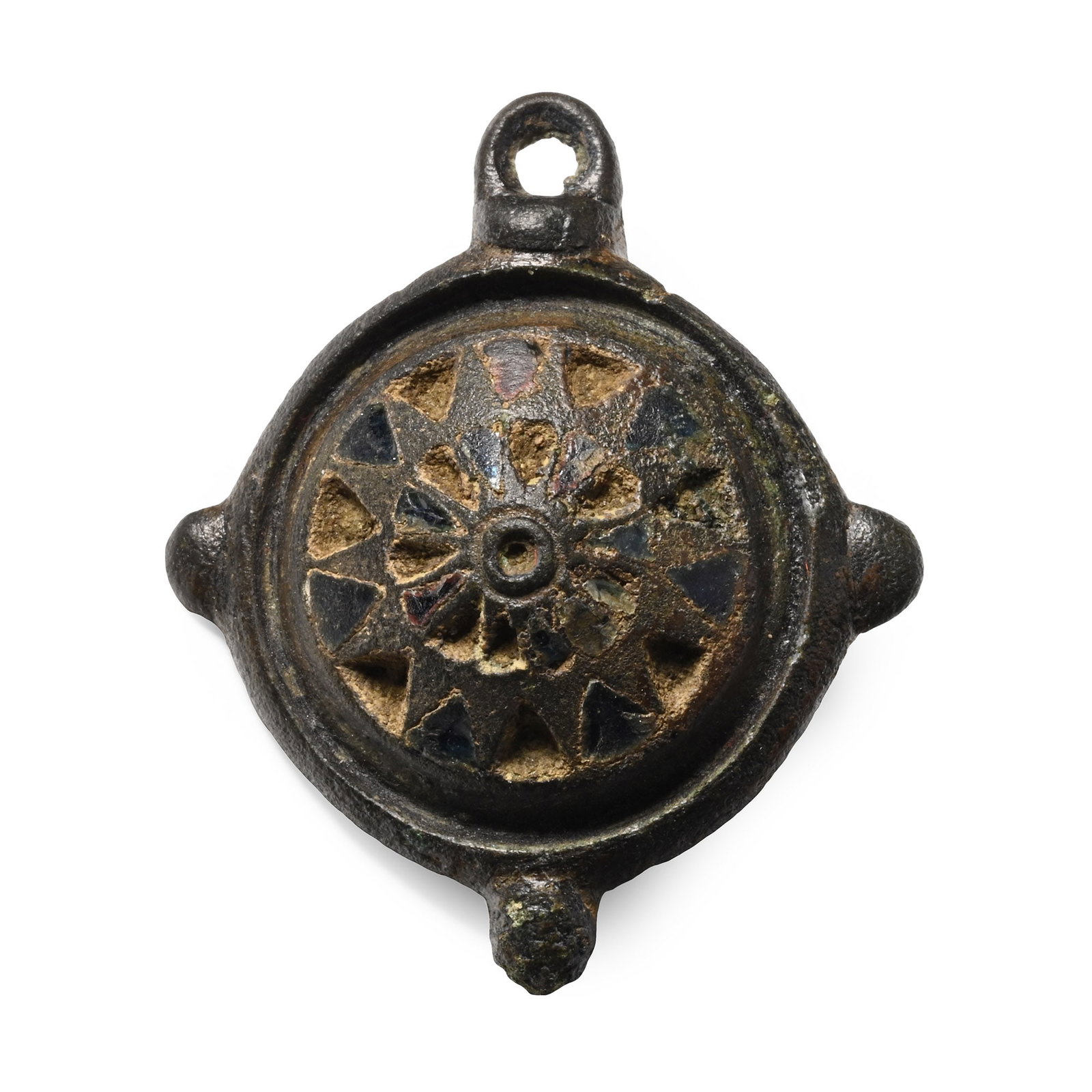 Roman Enamelled Bronze Umbonate Brooch: 2nd century A.D. Domed body decorated with two concentric circles of narrow, inward-pointing triangles with traces of blue enamel, small bosses and a loop to the outer rim; pin-lugs and a pin on the r