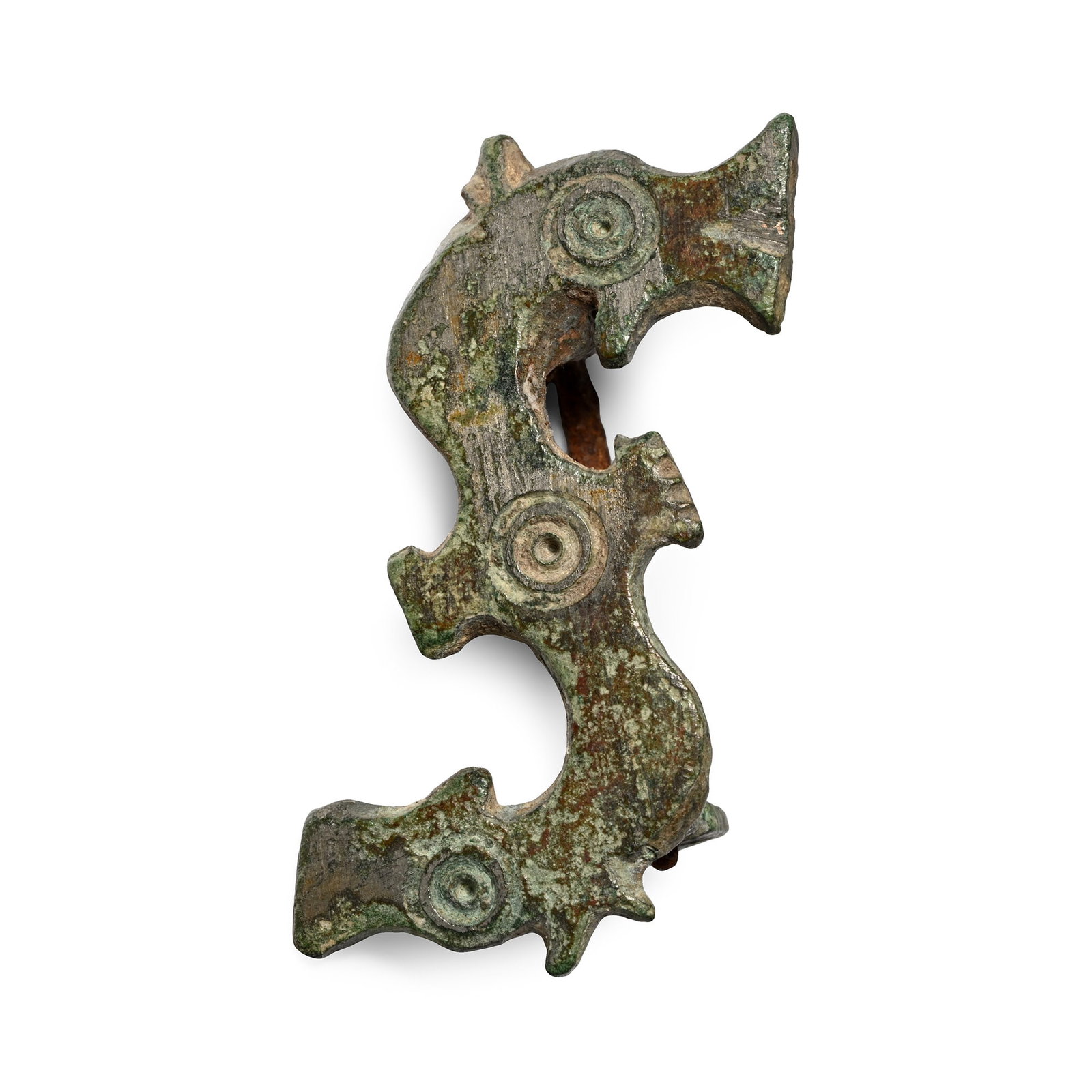 Roman Tinned Bronze S-Shaped Horse Head Brooch: Circa 3rd-4th century A.D. Plate brooch formed as two stylised horse heads with ring-and-dot detailing, pin and catch on the reverse. 7.23 grams, 36 mm (1 3/8 in.). Ex German art market, 2000s. Acquir