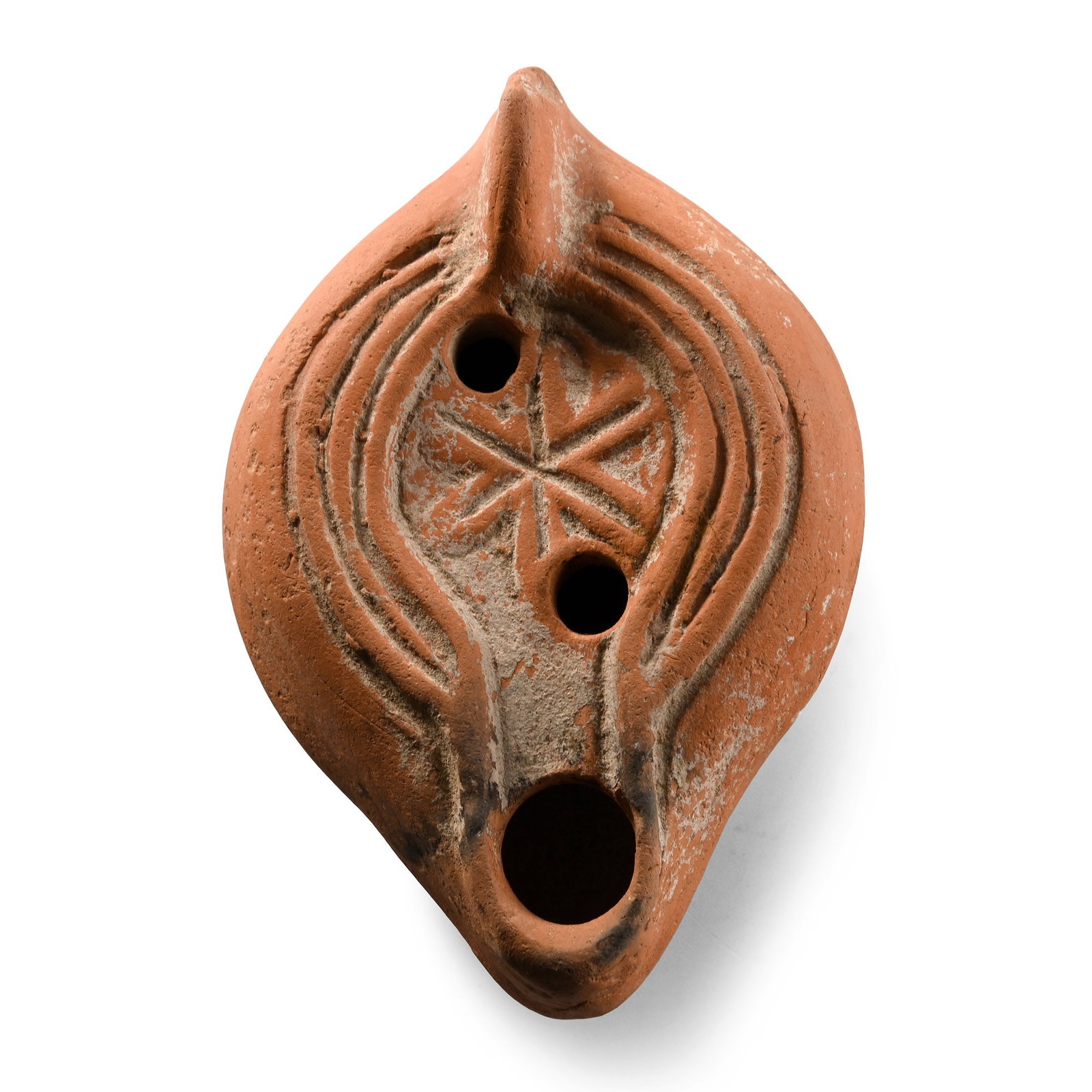 Roman Terracotta Oil Lamp with Star: Circa 3rd-4th century A.D. Three concentric lines surround the discus with a six-pointed star motif, a short nozzle and a lug handle, inked collector's number '379' on the base. Cf. Rosenthal R., Siva