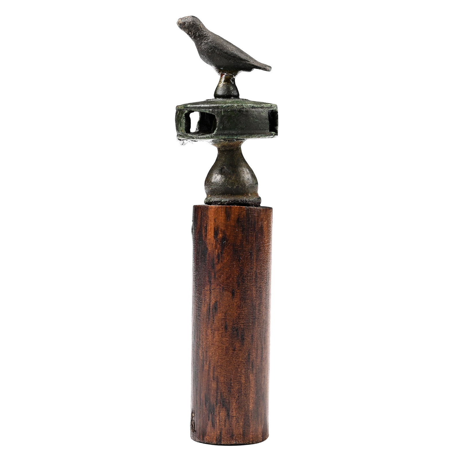 Roman Bronze Sceptre Finial: 100-400 A.D. Bulbous foot attached to a thick openwork disc and topped by a standing eagle; repaired, mounted on a display stand. Cf. similar mounts in the shape of a bird in PAS: LVPL-BB6DC1, NARC-BE