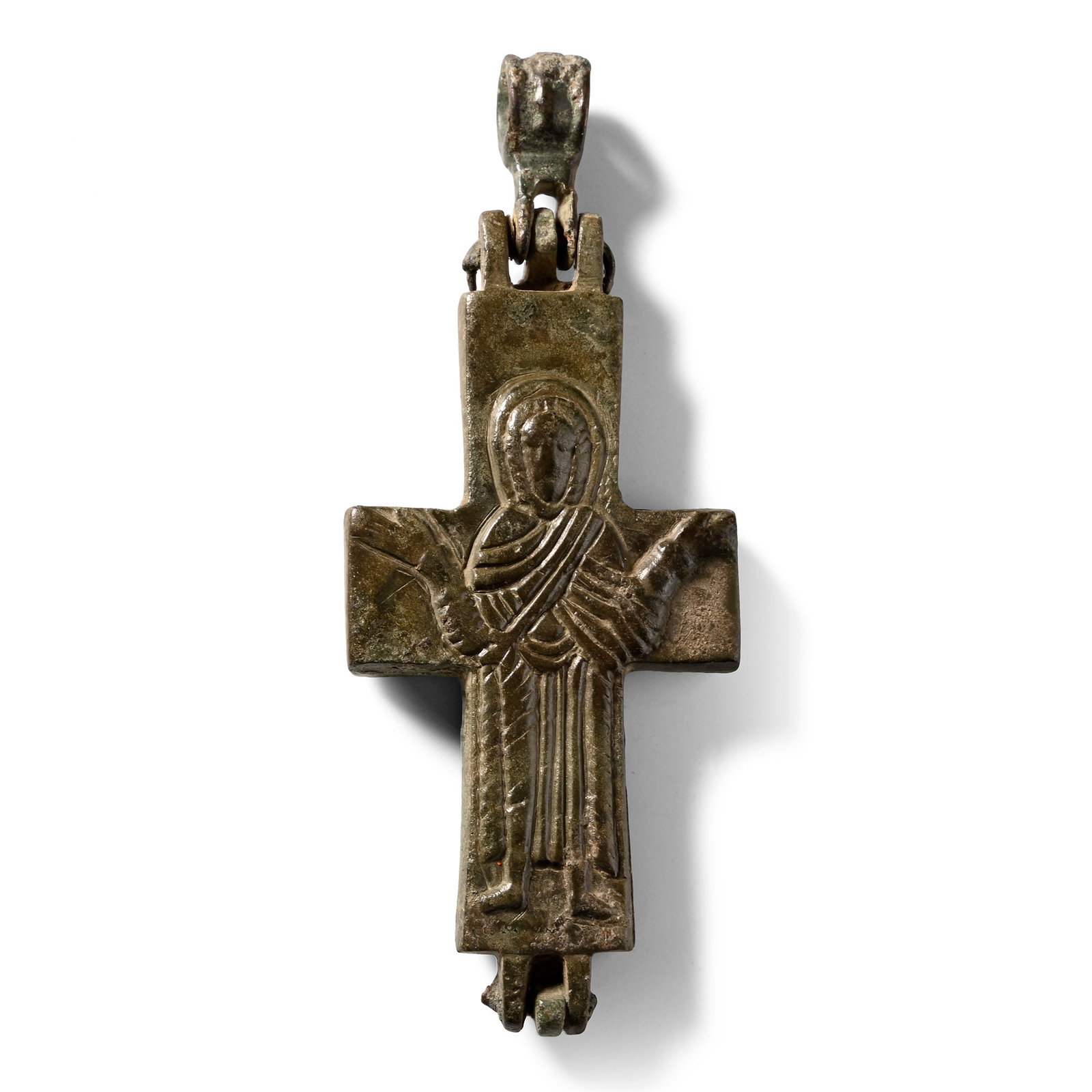 Large Byzantine Bronze Reliquary Cross Pendant with Christ and Saint: Circa 10th-12th century A.D. Enkolpion with hinged and ribbed loop; low-relief nimbate figure in orans pose to reverse wearing draped robes; robed Corpus Christi to reverse with cross above. Cf. Wamse