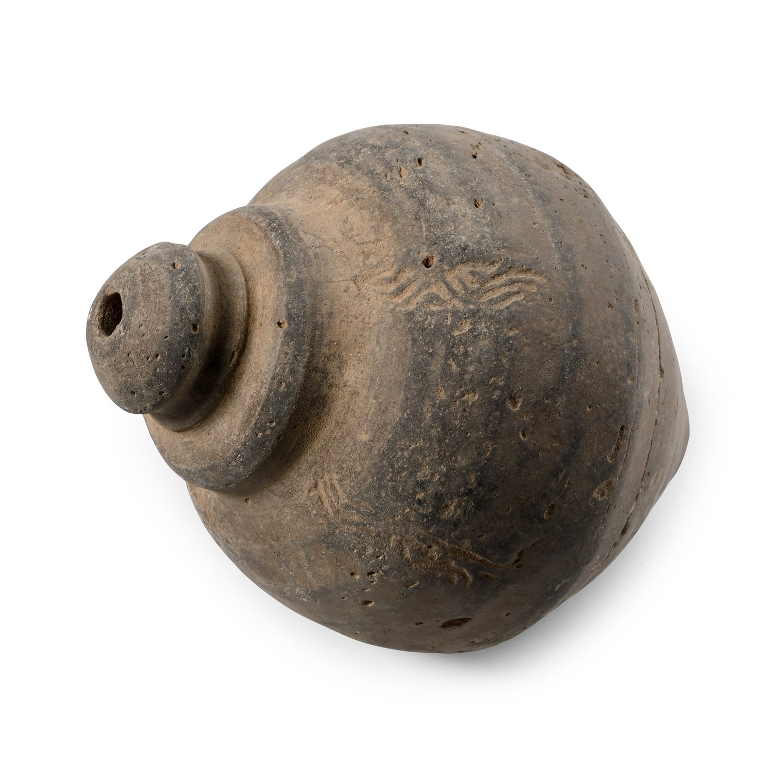 Byzantine 'Greek Fire' Ceramic Fire Bomb or Hand Grenade: 9th-11th century A.D. Piriform body with pointed base and domed mouth, stamped linear decoration on the upper body; intended to be filled with explosive liquid and a wick, and used as a hand grenade. 