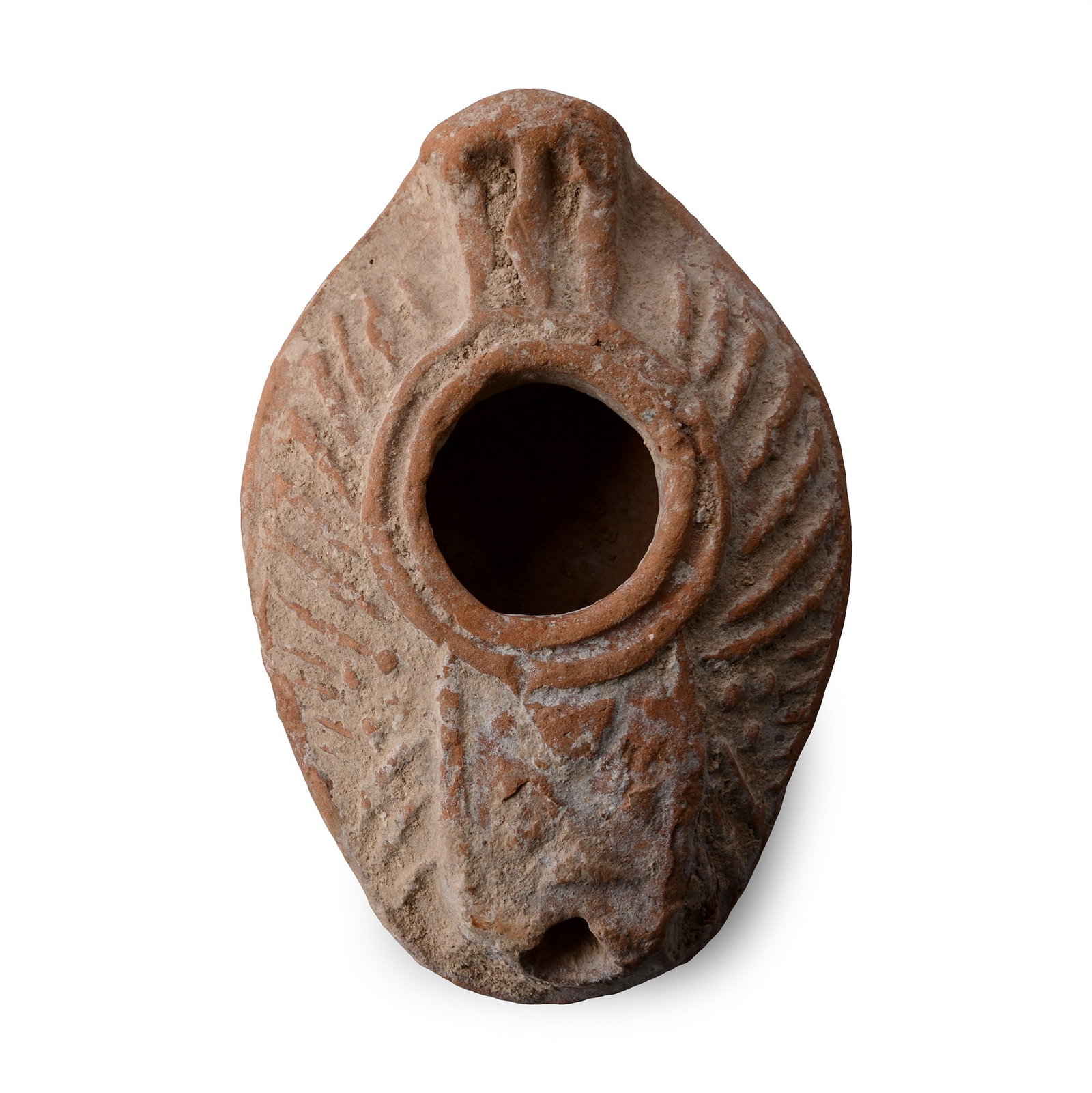 Byzantine Terracotta Oil Lamp with Linear Decoration: Circa 5th-7th century A.D. Linear decoration radiating from the large filler hole, with a small handle to the rear. Cf. Rosenthal, R., Sivan, R., Ancient Lamps in the Schloessinger Collection, Jerusal