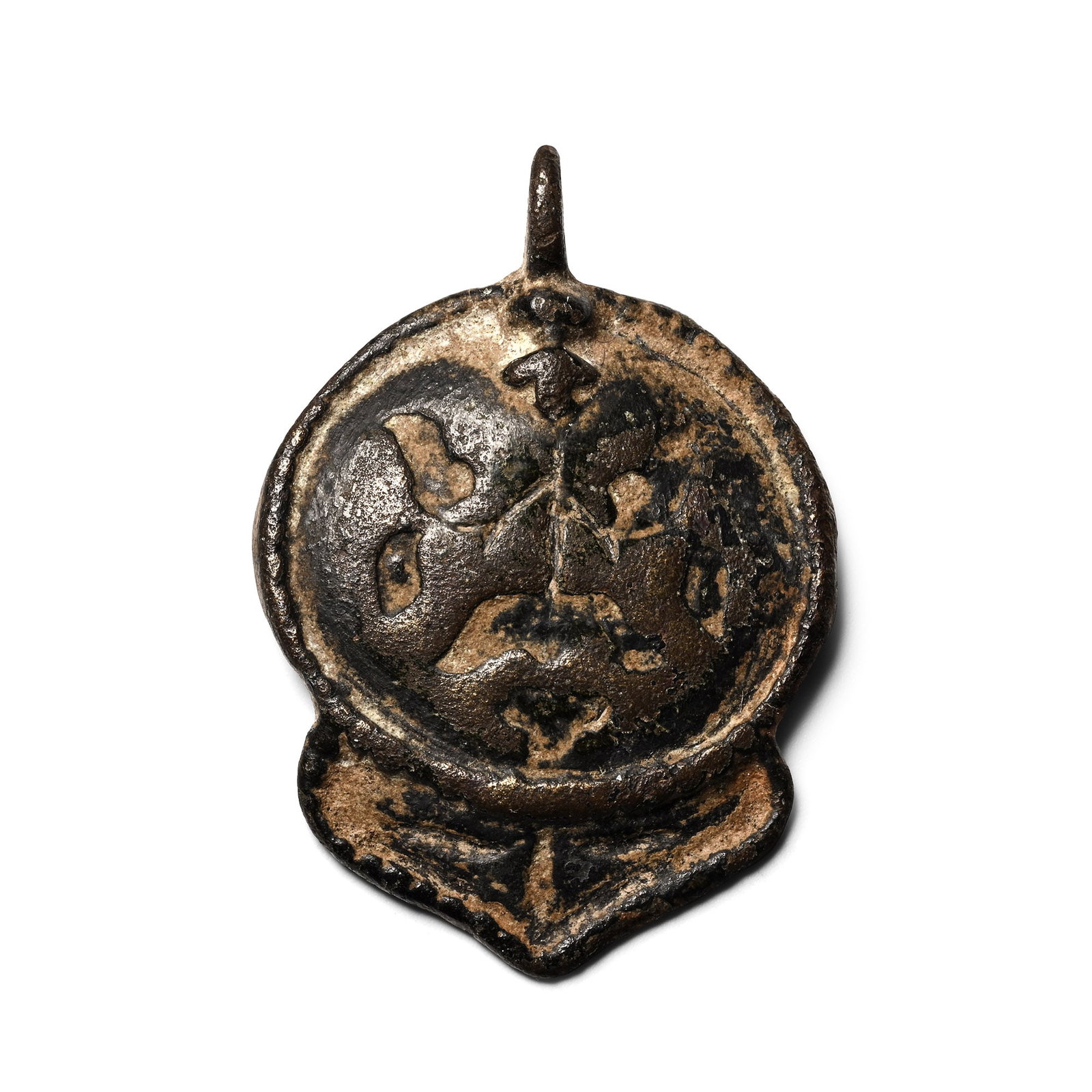 Eastern Roman Bronze Horse Harness Pendant: Circa 15th century A.D. Comprising a slightly domed disc with raised border and triangular flange to the lower edge; suspension loop above and remains of slider bar to reverse; incuse foliage design. 