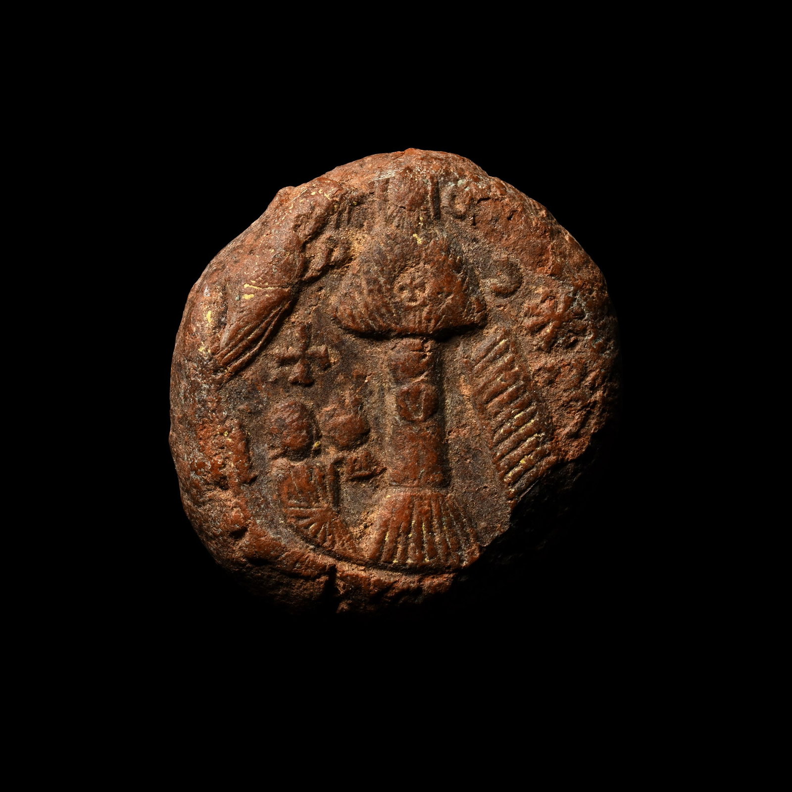 Byzantine Terracotta Bulla with St Simeon: Circa 7th century A.D. Plano-convex in section with reserved impression of a vertical pillar, ladder to one side, mother and infant to the other, crescent, star and other objects in the field. 15 gram