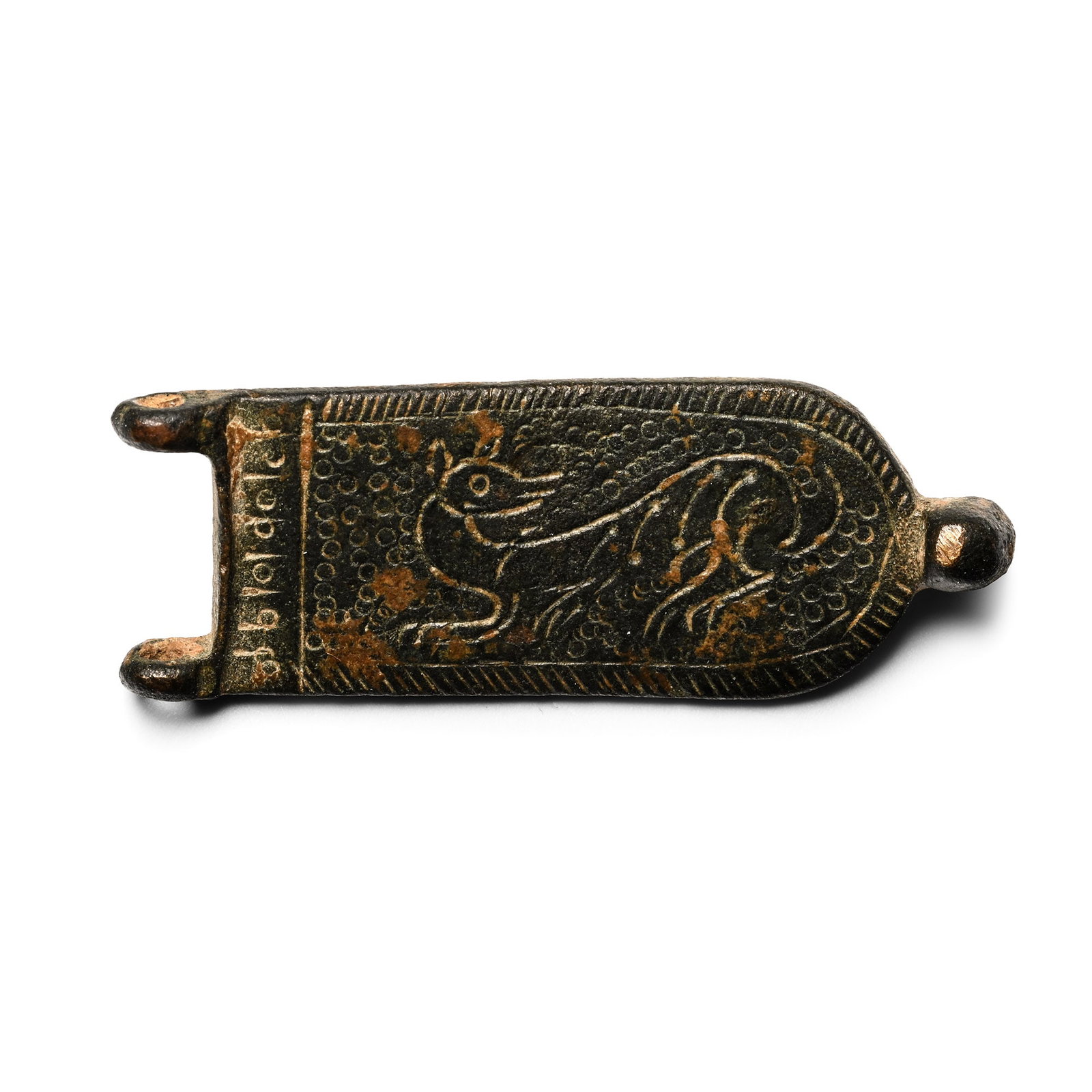 Byzantine Bronze Strap End with Beast Facing Back: Circa 8th century A.D. Tongue-shaped plate with a slender animal facing back, possibly depicting a ferret, pellets on the background. Cf. for the type Schulze-D?rrlamm, M., Byzantinische G?rtelschnall