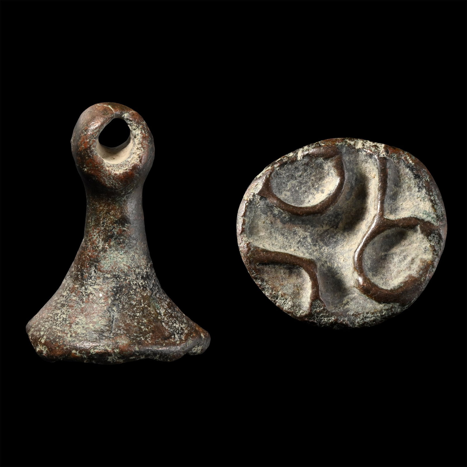 West Central Asian Bronze Chess Piece Type Seal Matrix with Interlocking Design: Circa 2200-1800 B.C. Discoid stamp seal with segmented face and tall handle; accompanied by an old scholarly note, typed and signed by W.G. Lambert, late Professor of Assyriology, University of Birmin