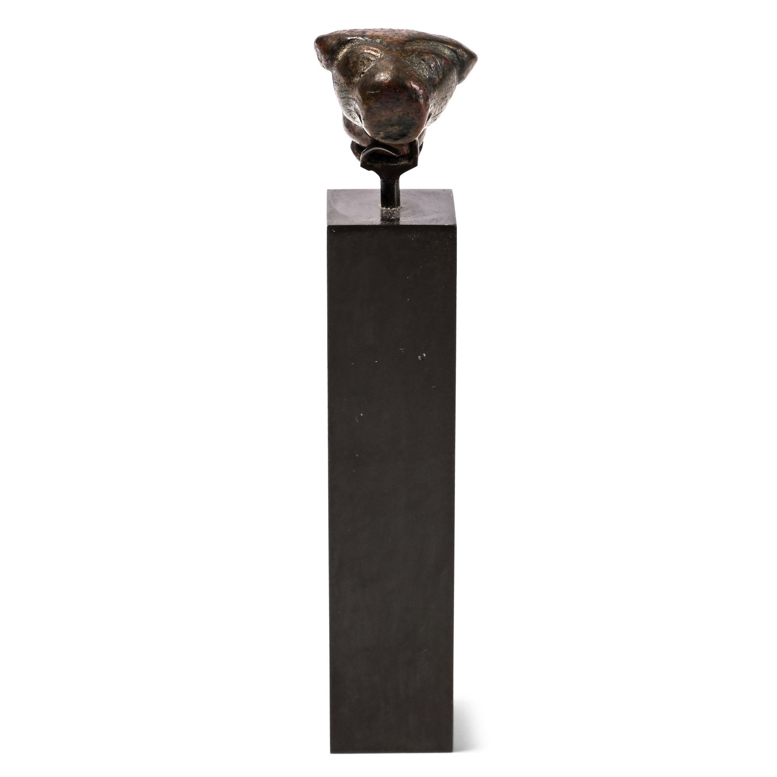 Western Asiatic Bronze Head of a Lioness: 1st millennium B.C. Modelled in the round with short muzzle and ears laid flat, incised detailing to the eyes and whiskers; mounted on a custom-made stand. 169 grams total, lion: 25 mm, 93 mm high inc