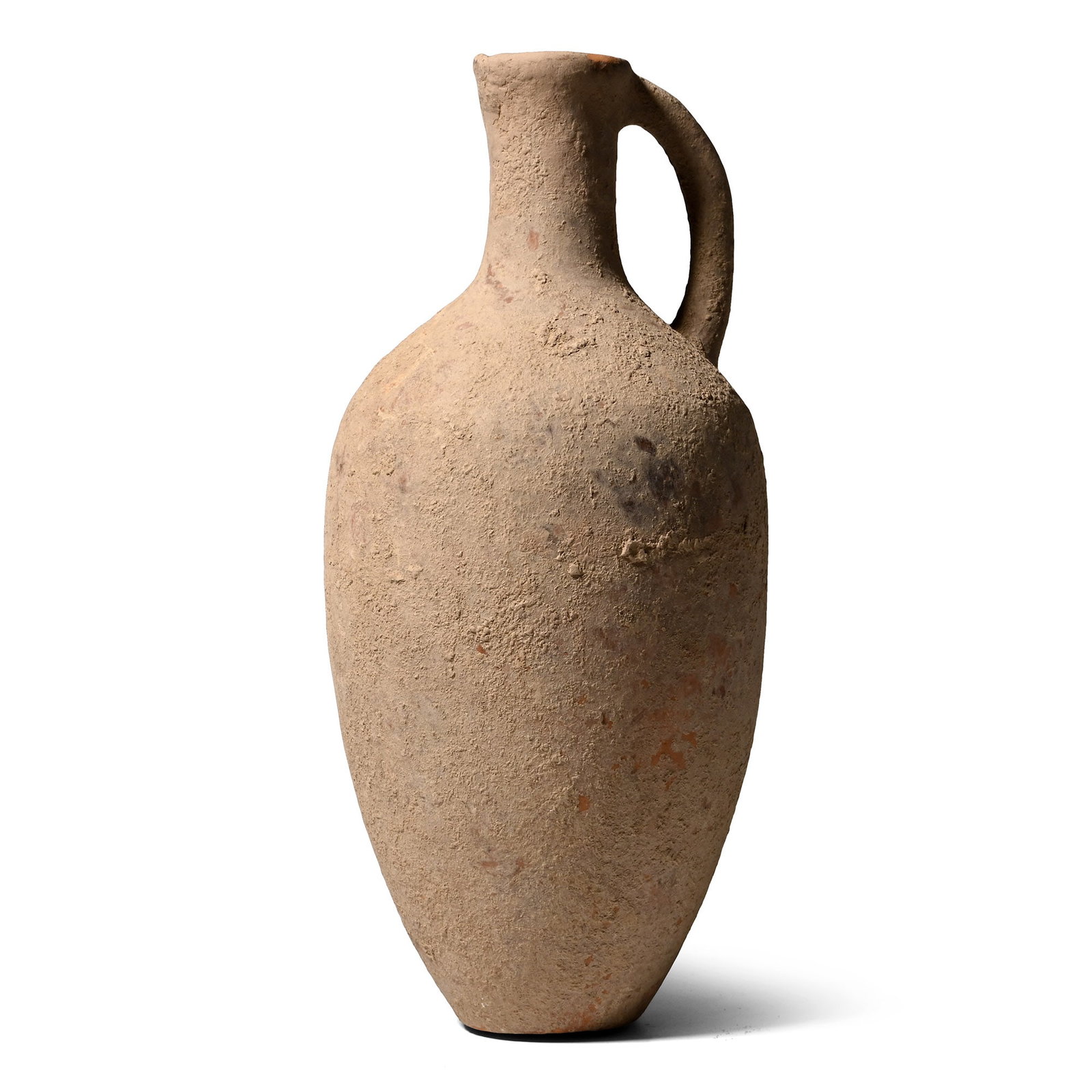 Western Asiatic Pottery Vessel with Handle: 1st millennium B.C. Ovoid body with flat base and narrow neck, a round-section handle to the rear. 360 grams, 22.5 cm (8 7/8 in.). From an important specialist collection, London, UK, 1990s. TimeLine 