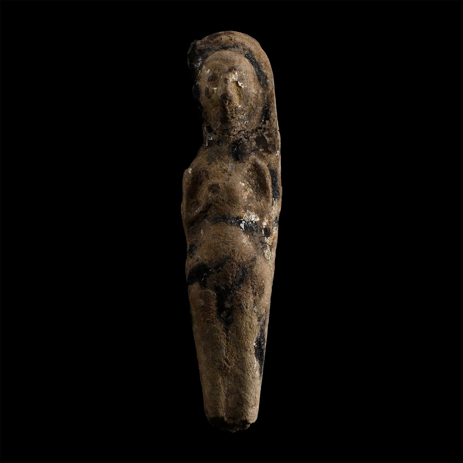 Western Asiatic Glazed Terracotta Fertility Figure: Late 1st millennium B.C. Modelled in the half-round; D-shaped in section with applied black pigment detailing to hair and midriff; some iridescence. 23.2 grams, 92 mm (3 5/8 in.). Ex private collectio