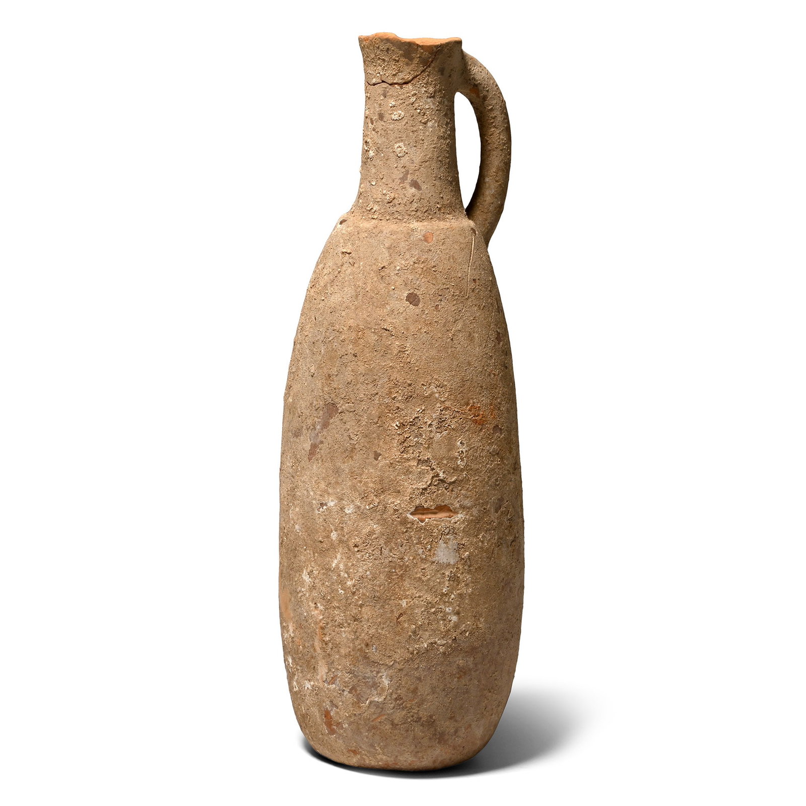 Western Asiatic Pottery Vessel: 1st millennium B.C. Slender cylindrical body with tubular neck and a strap handle to the rear. 200 grams, 18.7 cm (7 3/8 in.). From an important specialist collection, London, UK, 1990s. TimeLine Auct