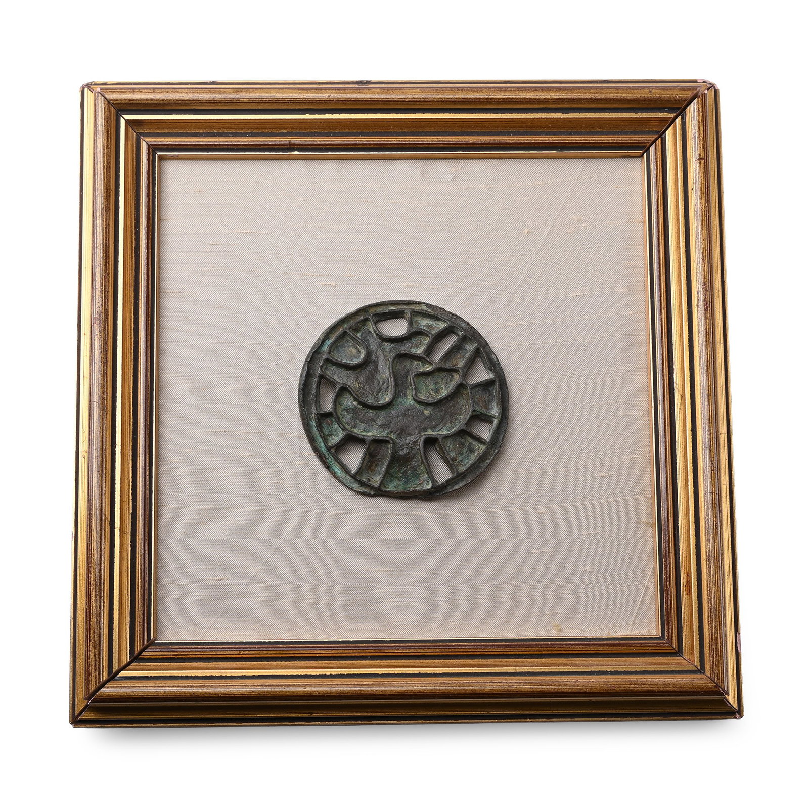 Bactrian Bronze Stamp Seal of a Bird: 2nd millennium B.C. Openwork disc with segmented detailing, mounted in a wooden frame. 298 grams total, seal: 58.6 mm (2 1/4 in.). Ex London, UK, gallery, 1971-early 2000s. London, UK, collection. Tim