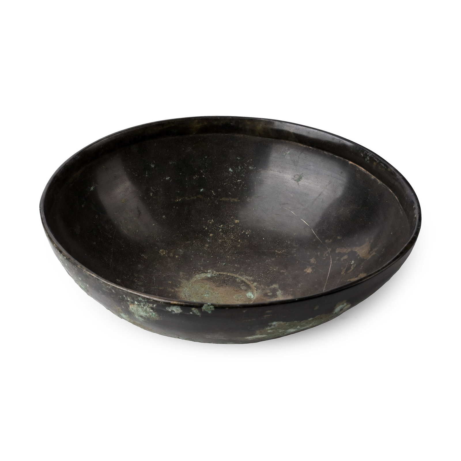 Western Asiatic Bronze Bowl: Circa 1st millennium B.C. Shallow bowl with rounded base and inturned rim. 260 grams, 14 cm wide (5 1/2 in.). [No Reserve] From a London, UK, collection, 1990s-2010. TimeLine Auctions follows a rigoro