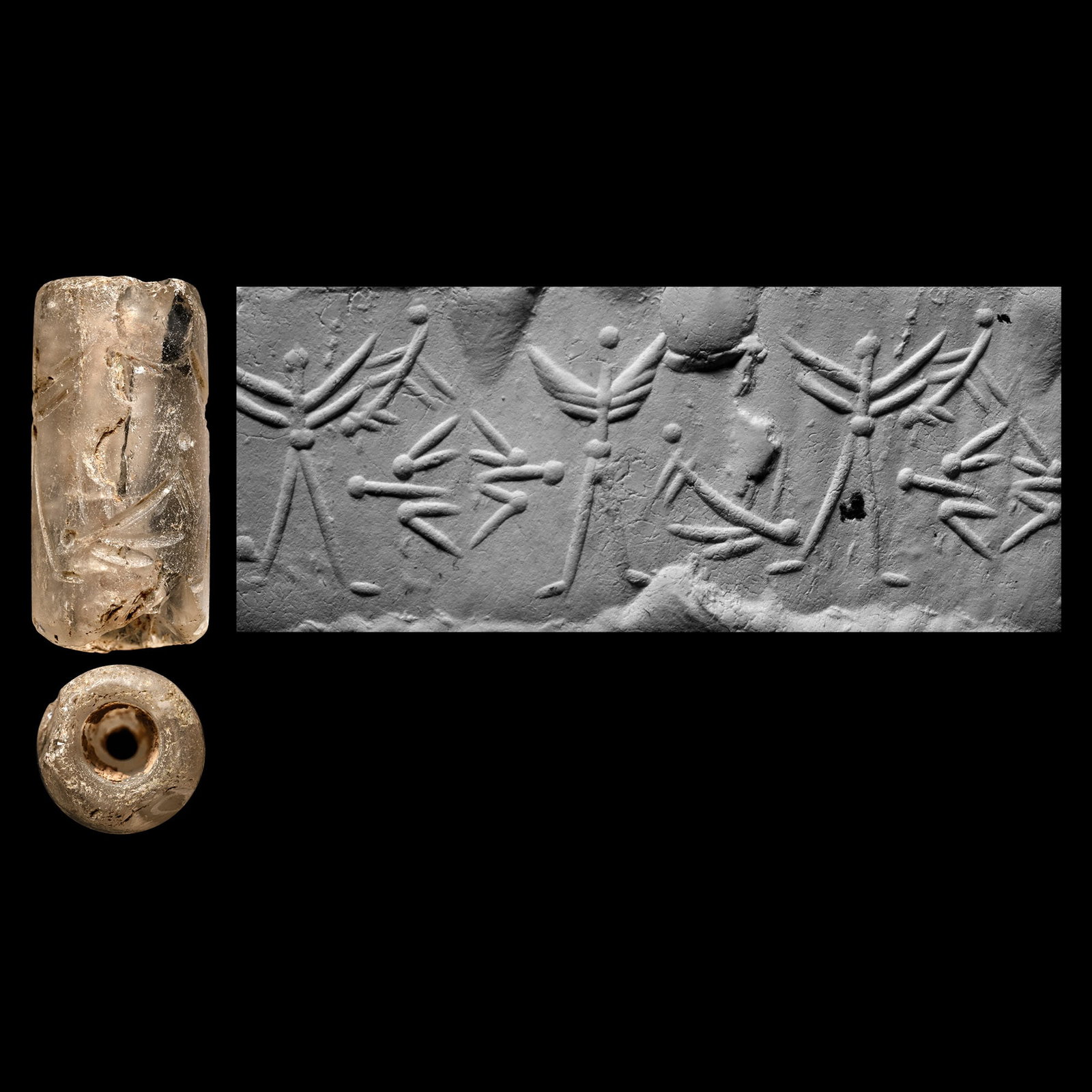 Neo-Assyrian Rock Crystal Cylinder Seal: Circa 700-600 B.C. Translucent seal with stylised winged figures; supplied with a museum-quality impression. See a cylinder in similar material and style in Niederreiter, Z., Catalogue of the cylinder