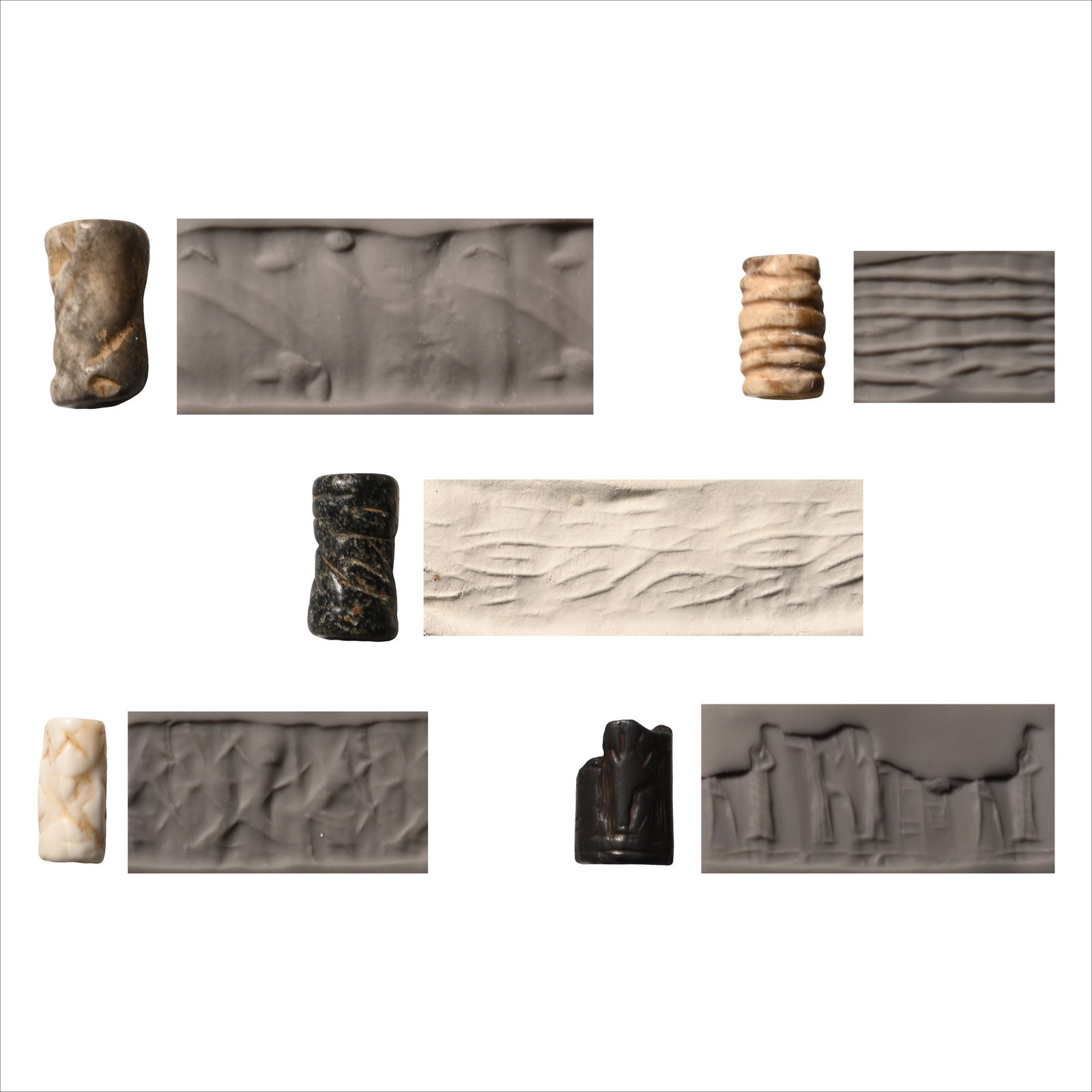 Western Asiatic Stone Cylinder Seal Group: 3rd-1st millennium B.C. Comprising: a dark brown steatite seal with linear motifs; a white limestone seal with a wave motif; a black steatite seal with a diabolo-shaped striped pattern; a hematite sea