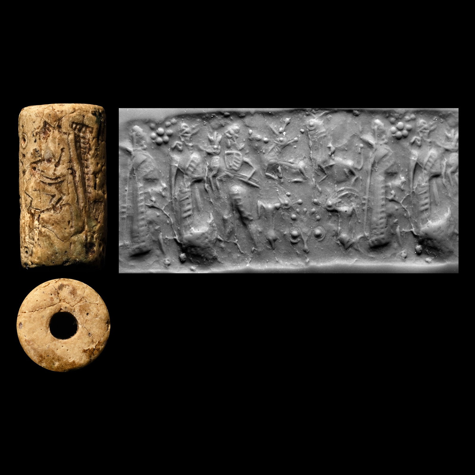Western Asiatic Buff Steatite Cylinder Seal with Figural Scene: 900-700 B.C. Frieze with two opposed standing figures wearing floor-length robes with fringed edges, ovicaprids and other beasts in the field; supplied with a museum-quality impression. Cf. a seal wit