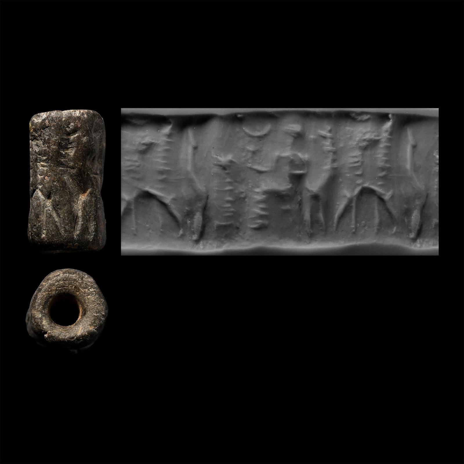 Western Asiatic Steatite Cylinder Seal with Deity and Beasts: Circa 1500 B.C. Showing a crescent moon and a standing beast, unusual filler motifs including a snake, an altar and a seated deity with a fringed skirt; supplied with a museum-quality impression. 3.65