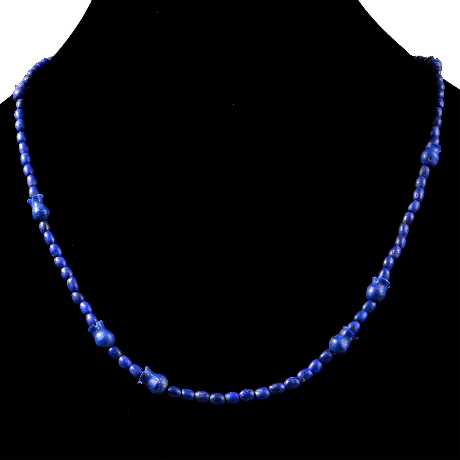 Bactrian Style Lapis Lazuli Bead Necklace String: 20th century A.D. Composed of small barrel-shaped and pomegranate-shaped beads, restrung. 15.2 grams, 55 cm (21 5/8 in.). [No Reserve] Acquired in the 1990s-early 2000s. Ex London, UK, collection. Tim