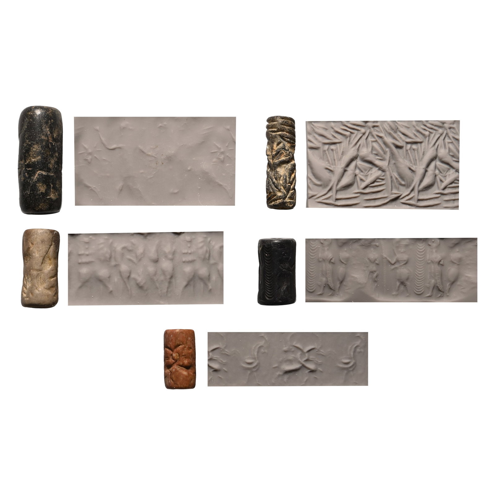 Western Asiatic Stone Cylinder Seal Group: 4th-1st millennium B.C. Comprising: frieze with three robed figures flanking a hatched column; two ibexes contending with looped necks, standing bird behind; deeply cut linear image of rearing ibexes;