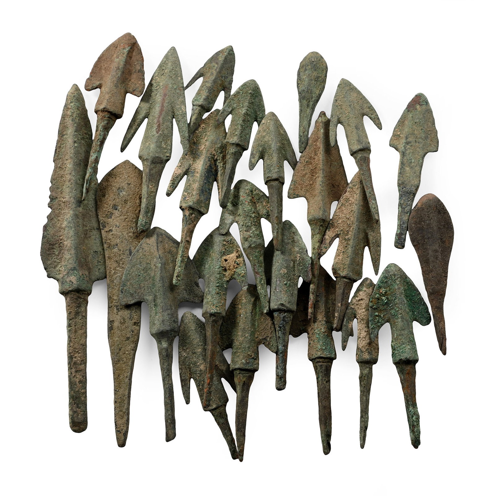 Western Asiatic Bronze Arrowhead Collection: 19th-10th century B.C. Comprising tanged arrowheads, most with barbs. Cf. for similar arrowheads Muscarella, O.W., Bronze and Iron Ancient Near Eastern Artifacts in the Metropolitan Museum of Art, New