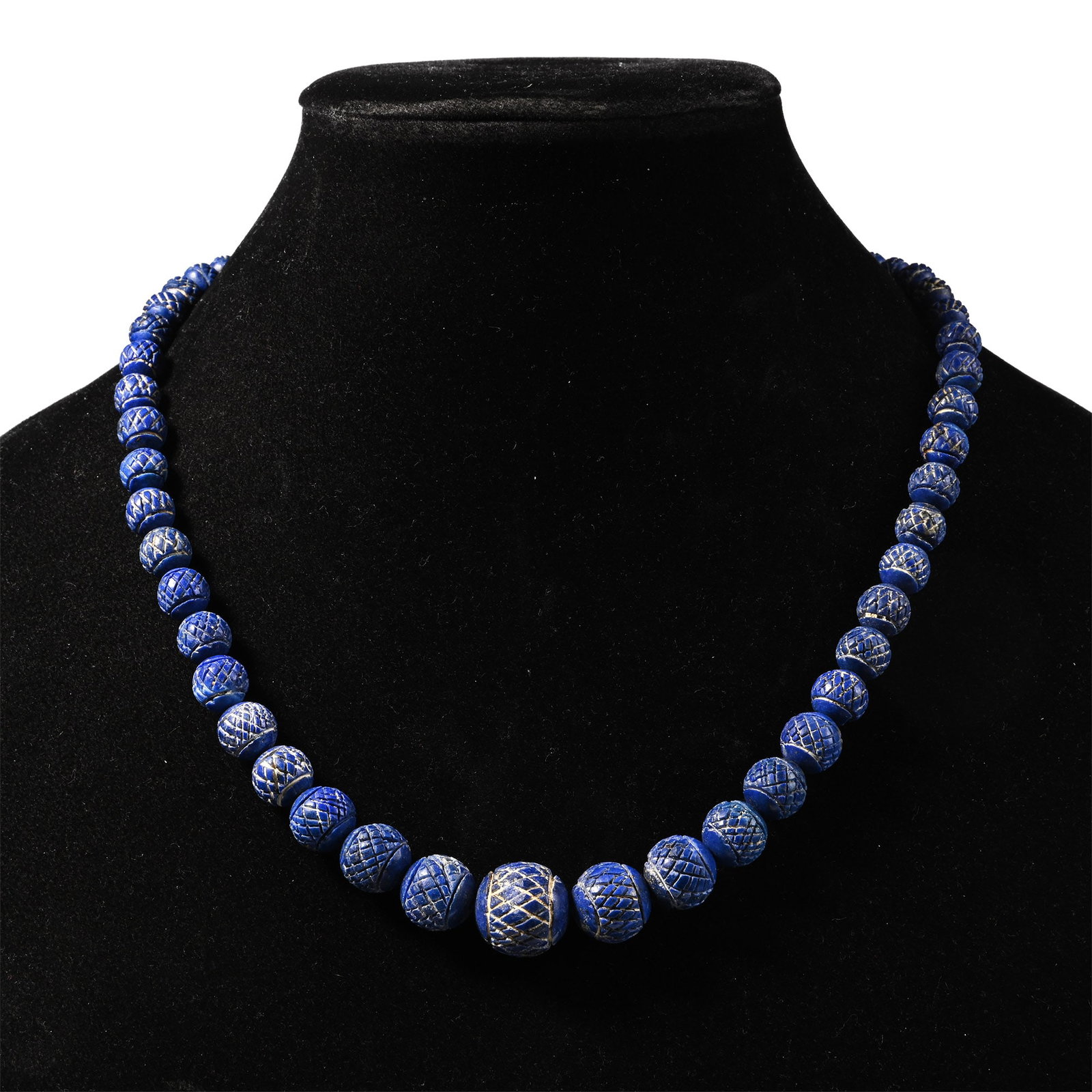 Bactrian Style Lapis Lazuli Bead Necklace String: 20th century A.D. Composed of graduated spherical beads with a hatched design, restrung. 61.5 grams, 42 cm (16 1/2 in.). [No Reserve] Acquired in the 1990s-early 2000s. Ex London, UK, collection. Time