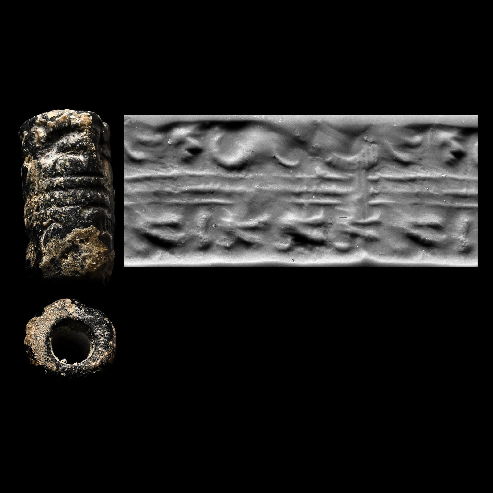 Syrian Haematite Cylinder Seal with Birds: Circa 1500-1200 B.C. A small seal with a central linear motif with birds in flight above nd ram horns below; supplied with a museum-quality impression. Cf. similar seal in Weber, O., Der Alte Orient, 