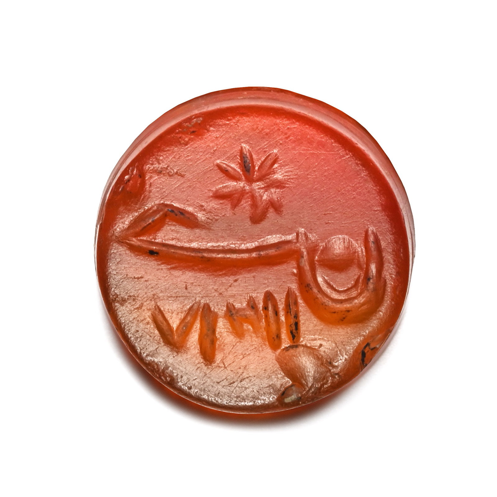 Western Asiatic Carnelian Gemstone with Calligraphic Text: Circa 18th-19th century A.D. Tabular type with calligraphic Naskh script legend; supplied with a museum-quality impression. 2.13 grams, 15 mm (5/8 in.). [No Reserve] From the private collection of a E