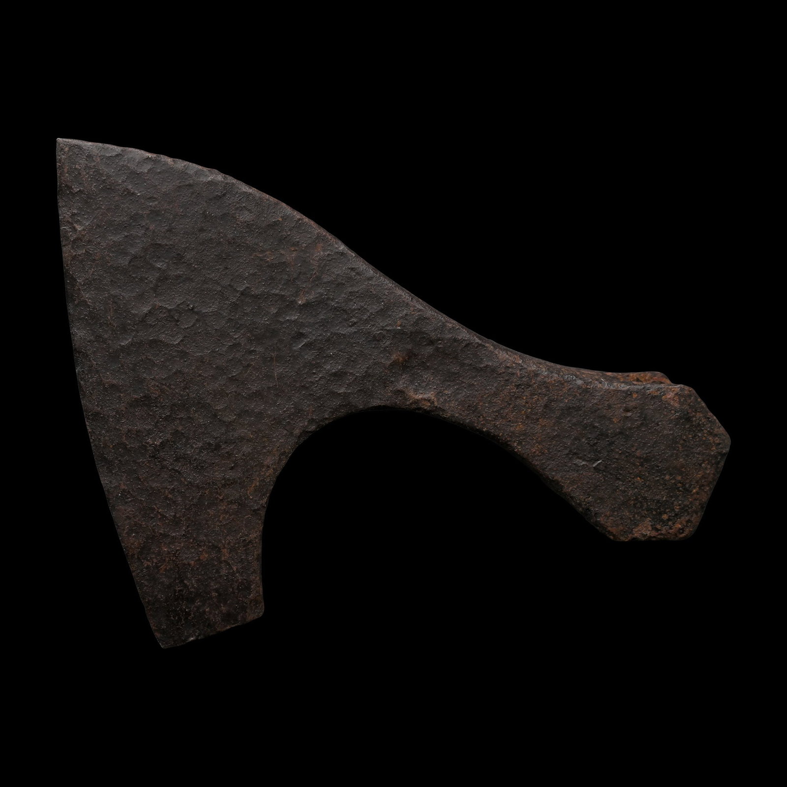 Viking Age Iron Bearded Axehead: Circa 9th-11th century A.D. Broad blade with thickened edge, rounded socket with lateral triangular extensions. 269 grams, 13.5 cm (5 3/8 in.). [No Reserve] Ex North American collection, 1970s. TimeLi