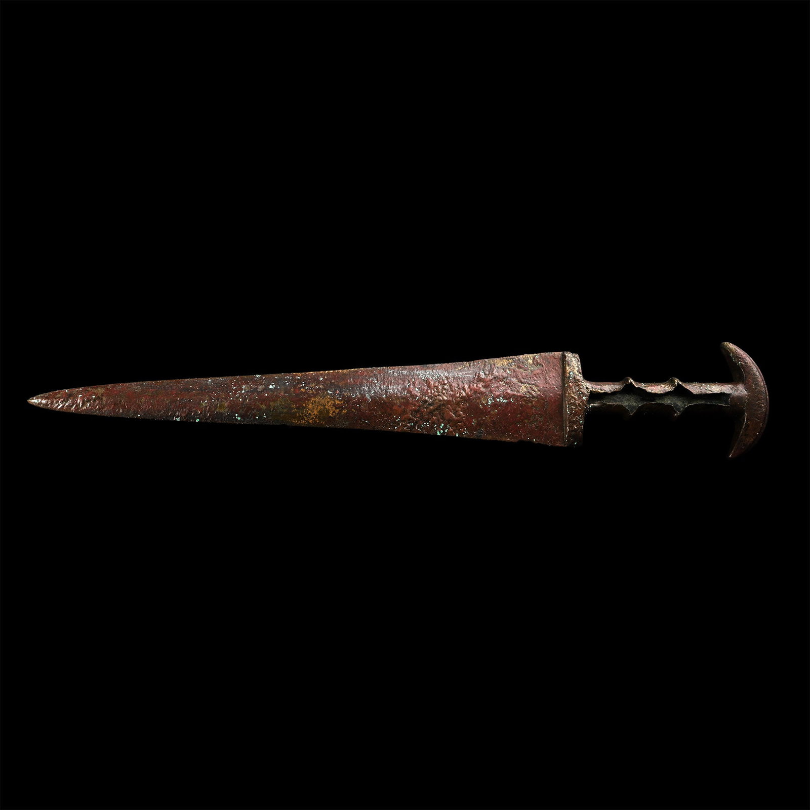 Luristan Bronze Short Sword with Crescent-Shaped Pommel: 10th century B.C. Comprising a triangular blade with integral ribbed handle and a crescentic pommel. Cf. Khorasani, M.M., Arms and Armour from Iran - The Bronze Age to the End of the Qajar Period, T?b