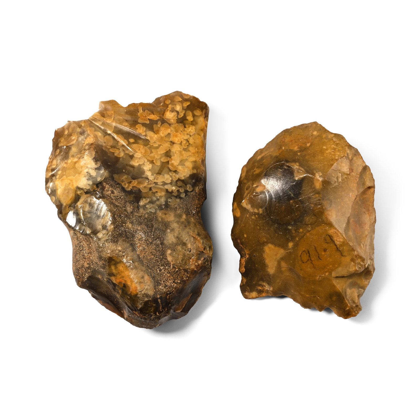 Stone Age Flint Debitage Group: Lower Palaeolithic Period, circa 700,000-300,000 B.P. or later. Comprising one debitage and possibly one natural, each with two inked collection notes, one with 'SNC 11.81 W.G.S.' and '4078/1/28' and 