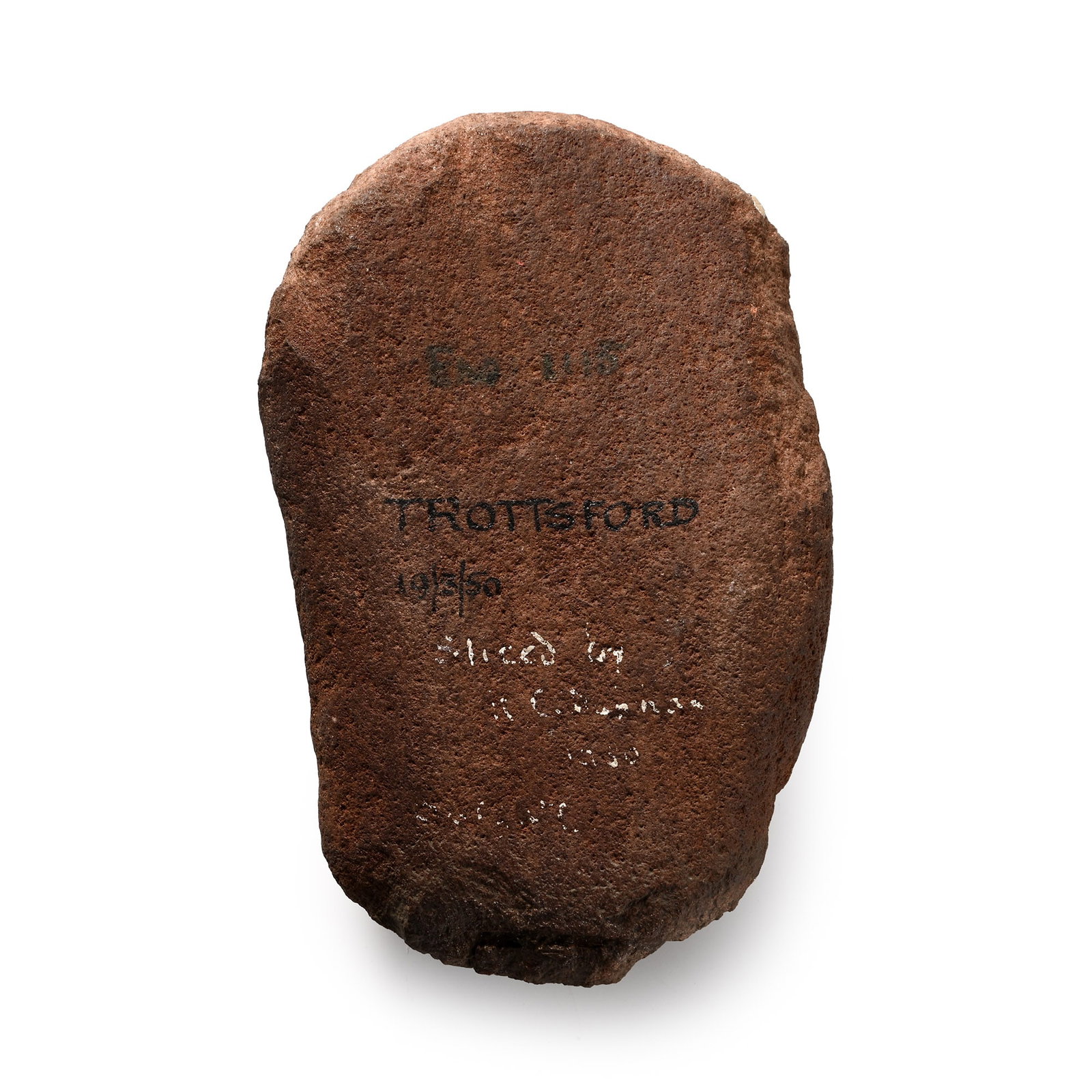 Norfolk Stone Age Polished Cherty Sandstone Tool: Neolithic Period, circa 6,000 B.P. Hammerstone with rounded ends; old typed label 'ENQ:III5, Cherty sand-stone. 1950', 'Trottsford 19/3/50' and others mainly effaced. 310 grams, 11.4 cm (4 1/2 in.). [