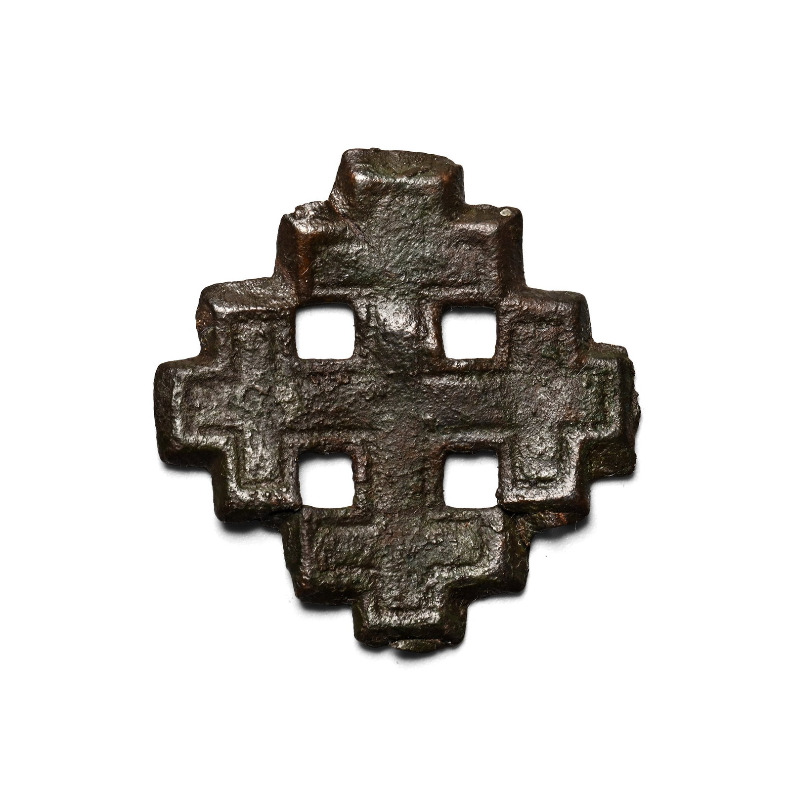 Medieval Bronze Knight's Holy Sepulchre Badge: Circa 13th-14th century A.D. Formed as a cross-crosslet, the symbol of the Knights of the Holy Sepulchre, with a punched-point border. Cf. Mitchiner, M., Medieval Pilgrim & Secular Badges, London, 198