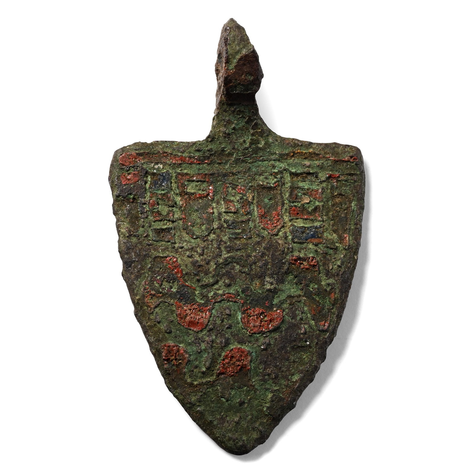 Medieval Knight's Enamelled Bronze Heraldic Horse Harness Pendant: Circa 13th-14th century A.D. Heater-shaped with pierced suspension lug above; enamelled field in undy (wavy) lines with label in chief. 8.69 grams, 42 mm (1 5/8 in.). [No Reserve] From a UK collection