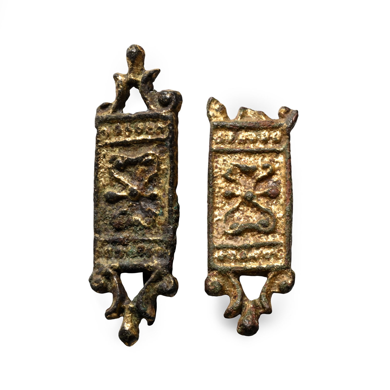 Tudor Period Knight's Gilt-Bronze Belt Mount Group: Circa 16th century A.D. Matched pair of rectangular mounts with low-relief floral decoration flanked by pelletted borders and openwork finials. 8.9 grams total, 35-43 mm (1 3/8 - 1 5/8 in.). [2, No Re