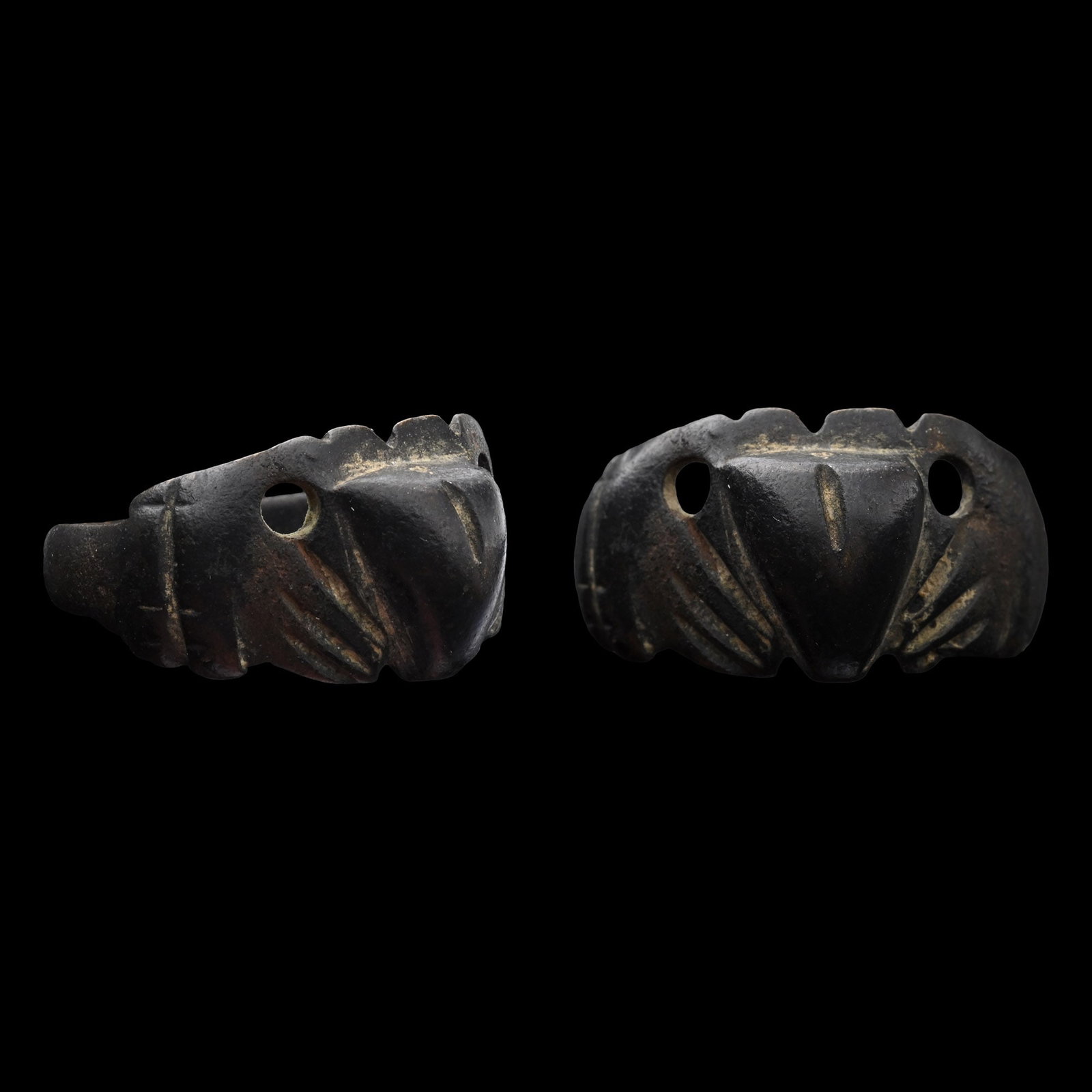 Stuart Period Bronze Hands Holding Heart Ring: 17th century A.D. Claddagh ring with a tapering hoop, the bezel with two hands holding a raised heart. 3.71 grams, 21.00 mm overall, 16.15 mm internal diameter (approximate size British K, USA 5 1/4, 