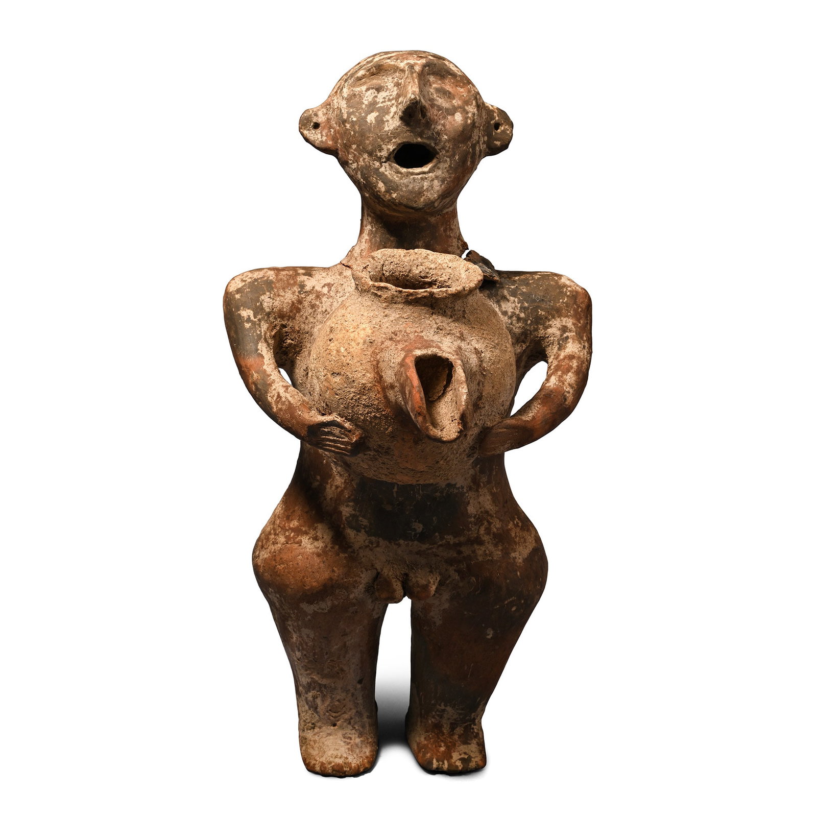 Marlik Style Terracotta Potbearer: 20th century A.D. Modelled standing and holding a bulbous spouted container in his extended hands, stylised head with projecting ears and open mouth; repaired. 1.92 kg, 30 cm (11 7/8 in.). [No Reserve