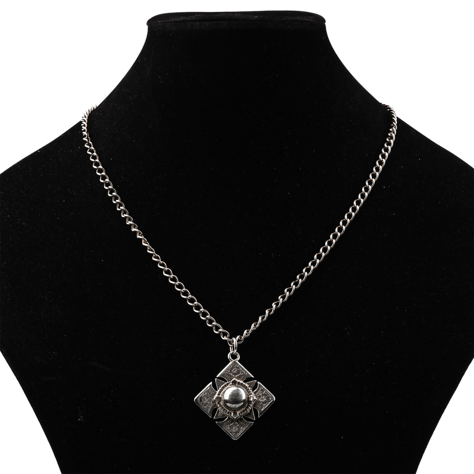 Post Medieval Engraved Silver Cross Pendant with Monogram: Late 19th-20th century A.D. Quatrefoil in plan with interstitial tags, central pelleted collar and dome; incised hatched rosette to each petal; copperplate monogram to reverse with 'FG'; with late 20t