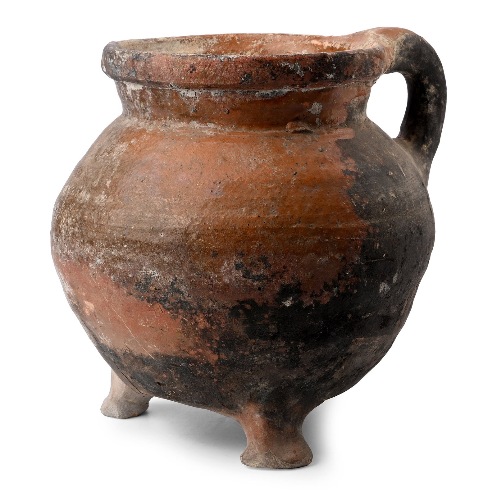 Tudor Period Glazed Ceramic Tripod Cooking Vessel: 16th century A.D. Comprising a bulbous body with an everted rim and a loop handle to the rear, three flaring feet on the underside. 1.05 kg, 20.6 cm wide (8 1/6 in.). [No Reserve] From a UK collection